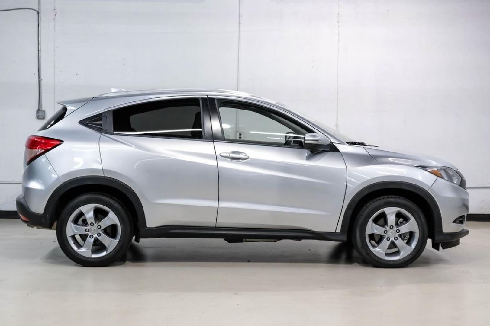 2016 Alabaster Silver Metallic /Black Honda HR-V EX-L (3CZRU5H76GM) with an 1.8L I4 SOHC 16V i-VTEC engine, CVT transmission, located at 15300 Midway Rd., Addison, TX, 75001, (972) 702-0011, 32.958321, -96.838074 - Photo#7