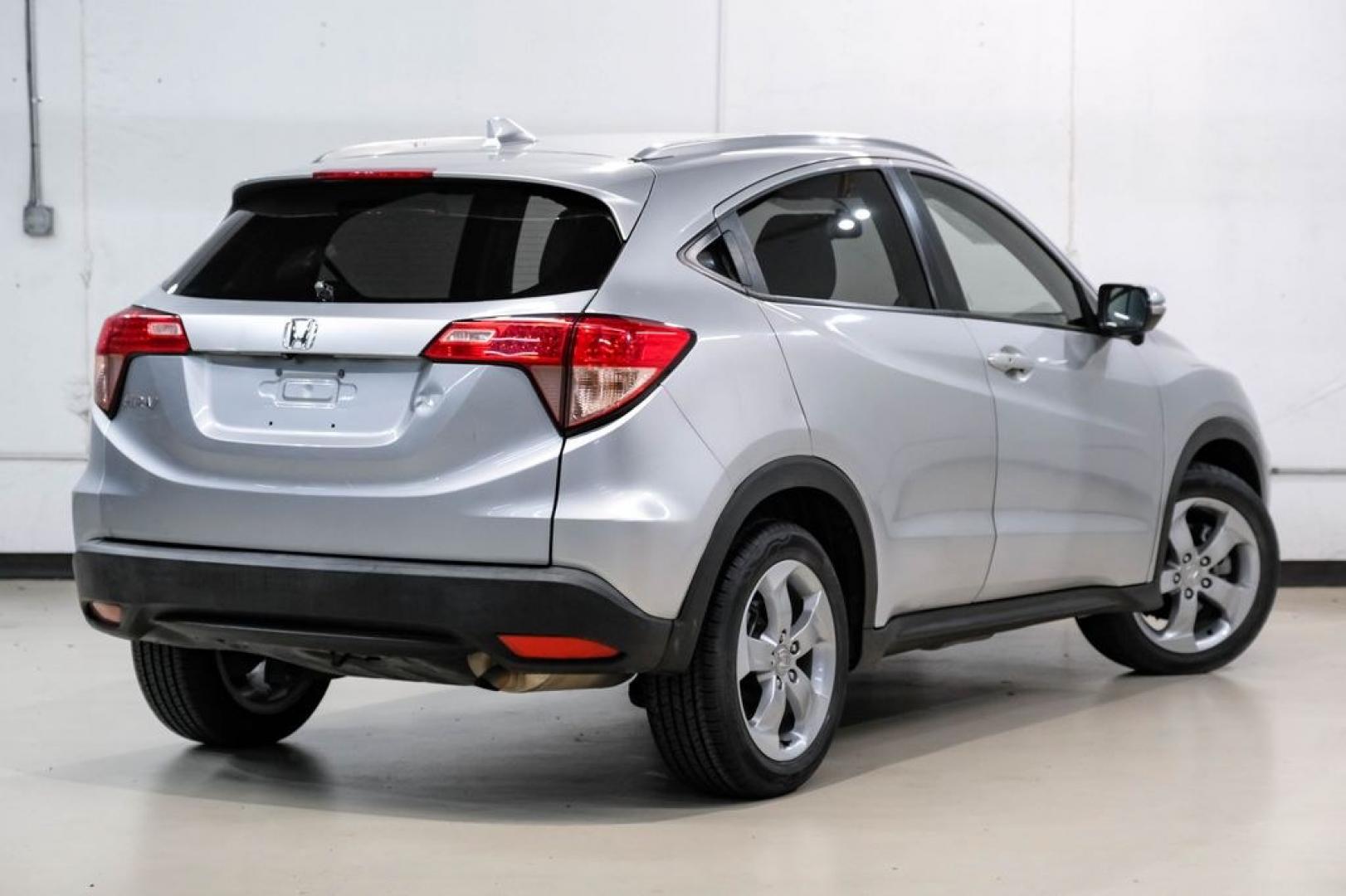 2016 Alabaster Silver Metallic /Black Honda HR-V EX-L (3CZRU5H76GM) with an 1.8L I4 SOHC 16V i-VTEC engine, CVT transmission, located at 15300 Midway Rd., Addison, TX, 75001, (972) 702-0011, 32.958321, -96.838074 - Photo#8