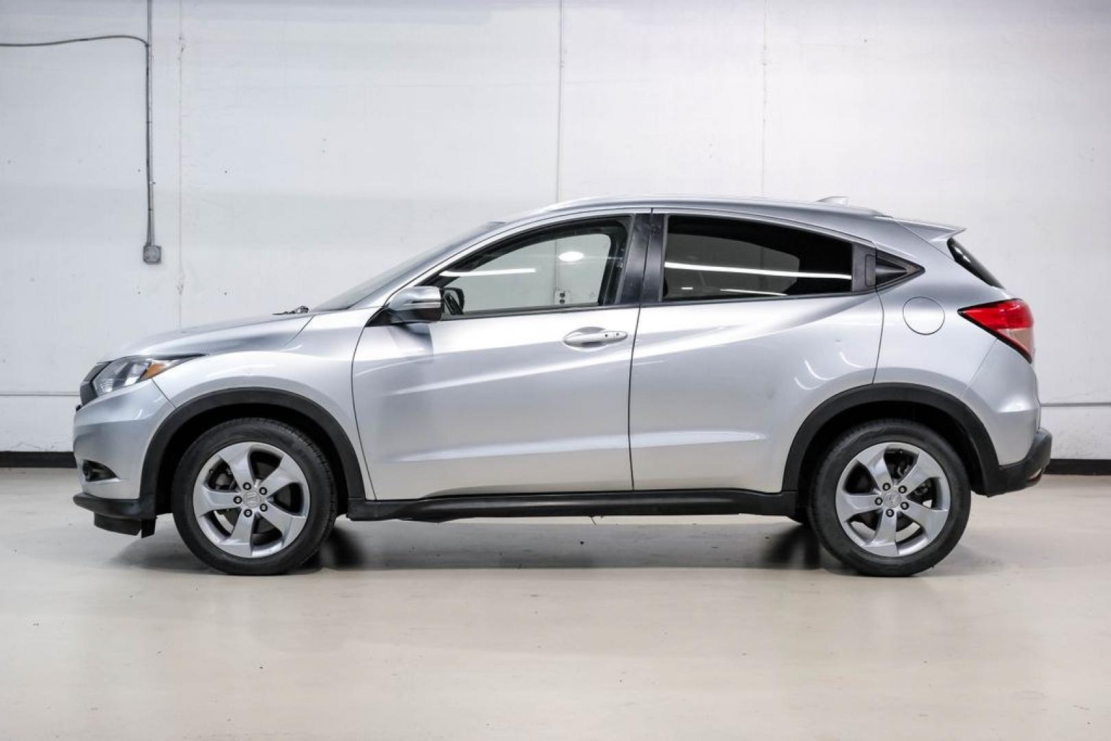 2016 Alabaster Silver Metallic /Black Honda HR-V EX-L (3CZRU5H76GM) with an 1.8L I4 SOHC 16V i-VTEC engine, CVT transmission, located at 15300 Midway Rd., Addison, TX, 75001, (972) 702-0011, 32.958321, -96.838074 - Photo#11