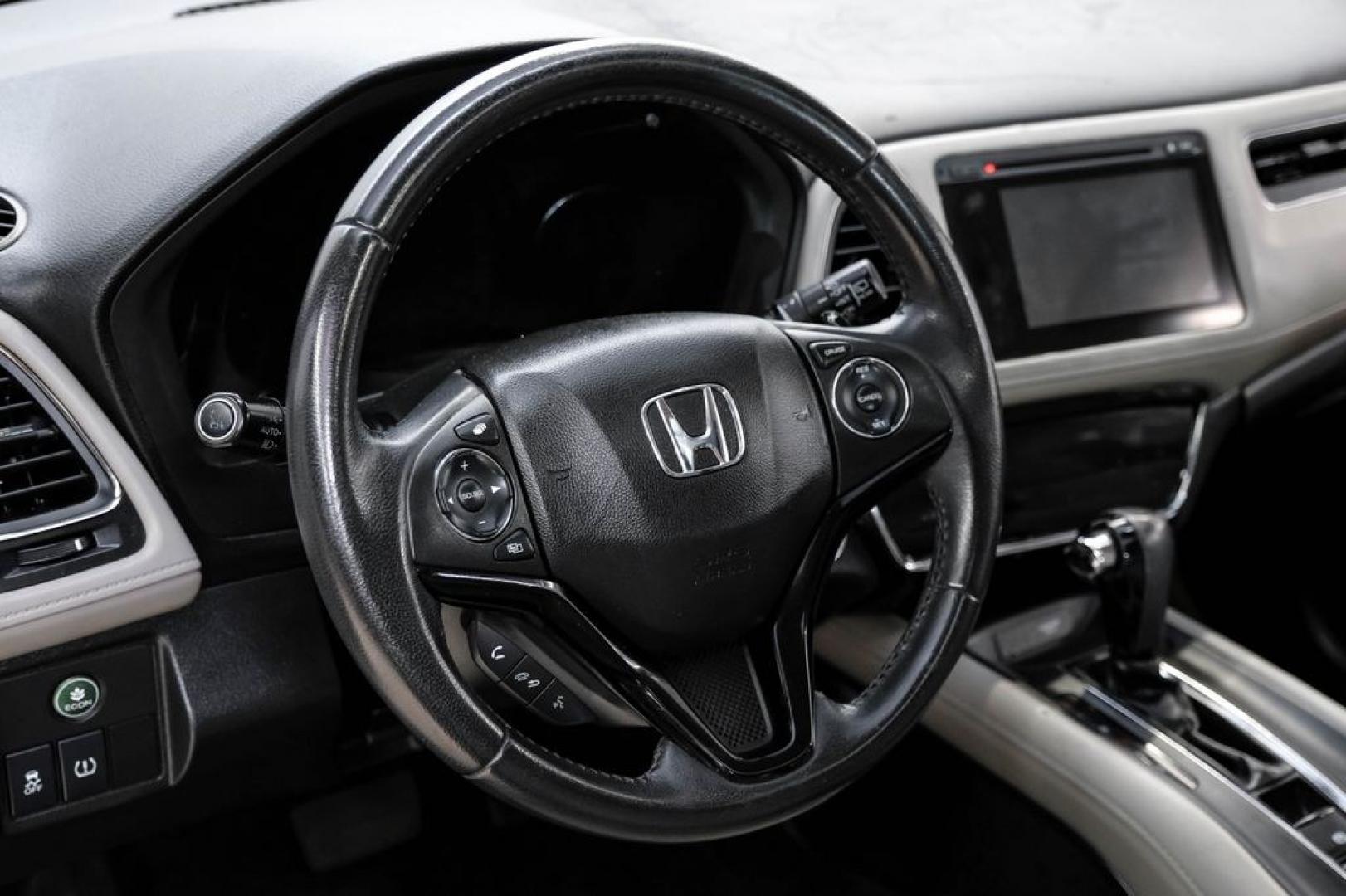 2016 Alabaster Silver Metallic /Black Honda HR-V EX-L (3CZRU5H76GM) with an 1.8L I4 SOHC 16V i-VTEC engine, CVT transmission, located at 15300 Midway Rd., Addison, TX, 75001, (972) 702-0011, 32.958321, -96.838074 - Photo#15