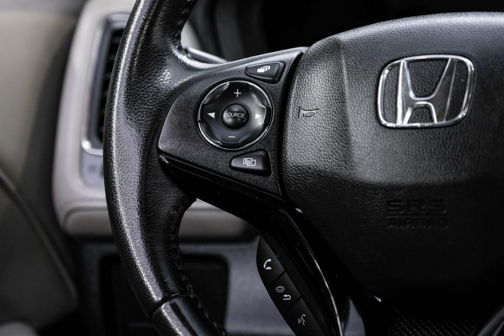 2016 Alabaster Silver Metallic /Black Honda HR-V EX-L (3CZRU5H76GM) with an 1.8L I4 SOHC 16V i-VTEC engine, CVT transmission, located at 15300 Midway Rd., Addison, TX, 75001, (972) 702-0011, 32.958321, -96.838074 - Photo#17