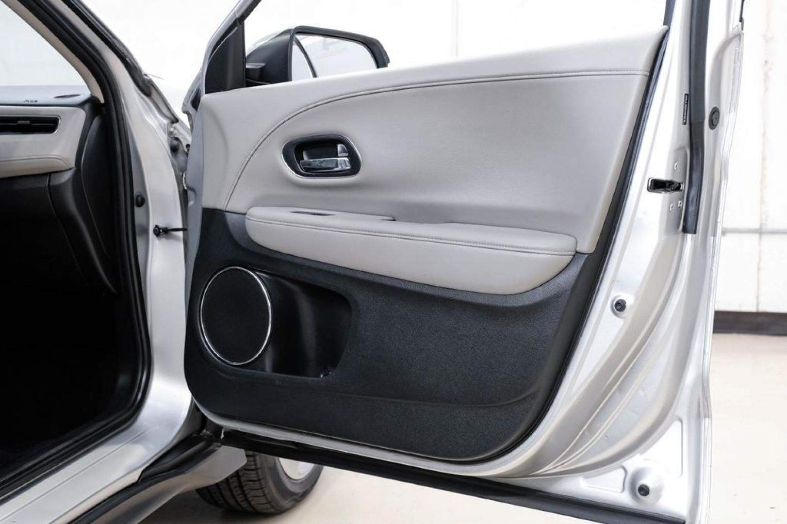 2016 Alabaster Silver Metallic /Black Honda HR-V EX-L (3CZRU5H76GM) with an 1.8L I4 SOHC 16V i-VTEC engine, CVT transmission, located at 15300 Midway Rd., Addison, TX, 75001, (972) 702-0011, 32.958321, -96.838074 - Photo#38