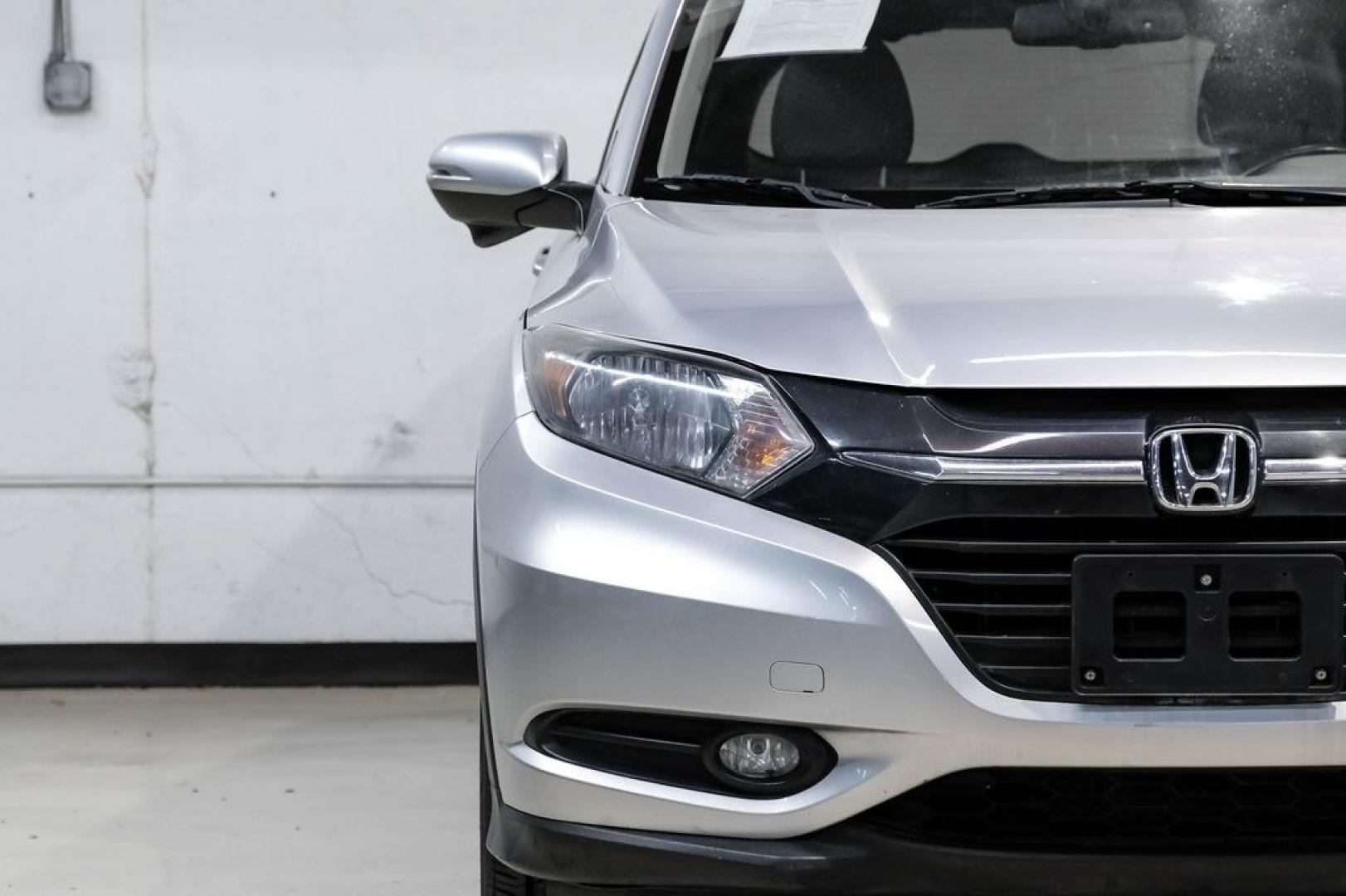 2016 Alabaster Silver Metallic /Black Honda HR-V EX-L (3CZRU5H76GM) with an 1.8L I4 SOHC 16V i-VTEC engine, CVT transmission, located at 15300 Midway Rd., Addison, TX, 75001, (972) 702-0011, 32.958321, -96.838074 - Photo#41