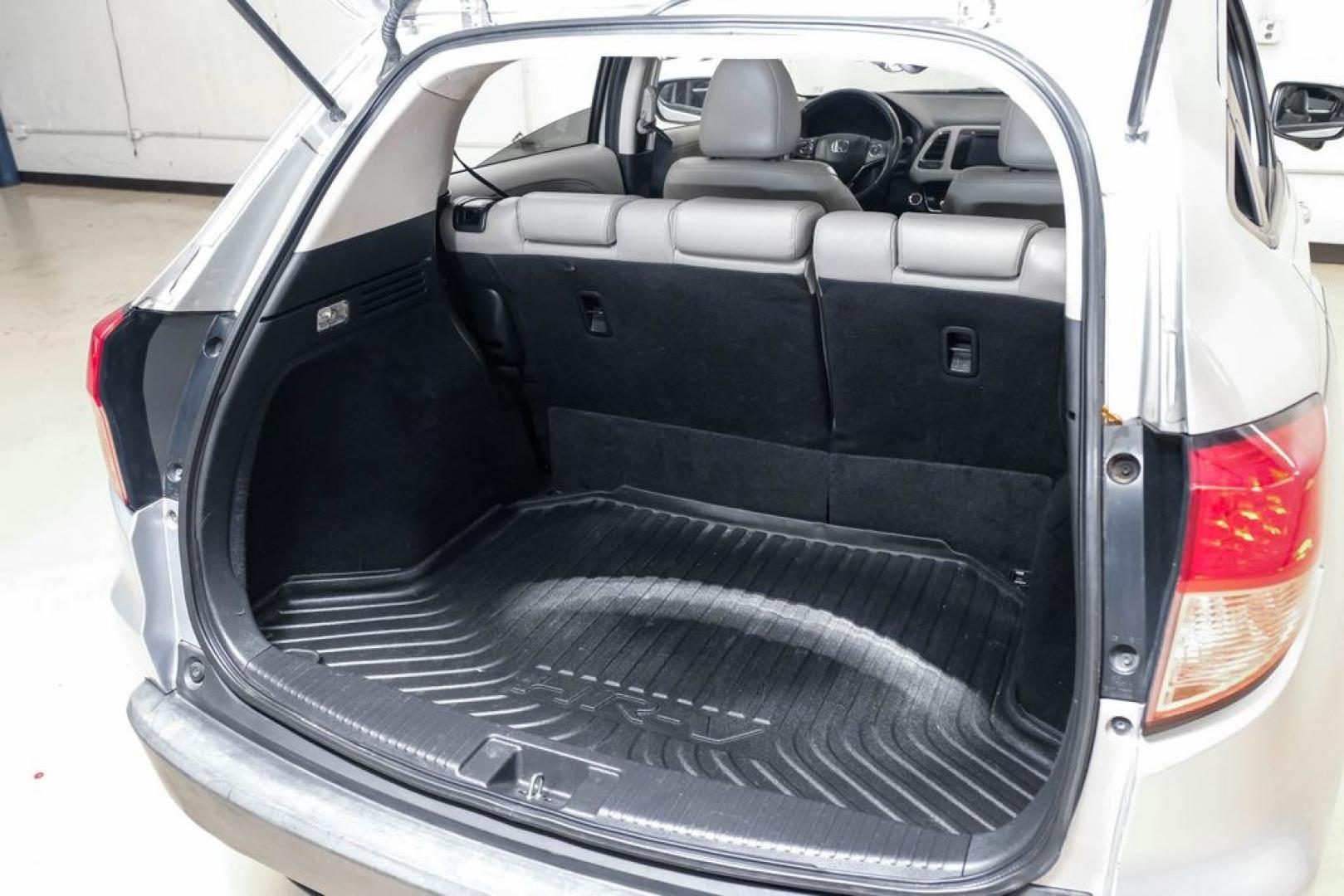 2016 Alabaster Silver Metallic /Black Honda HR-V EX-L (3CZRU5H76GM) with an 1.8L I4 SOHC 16V i-VTEC engine, CVT transmission, located at 15300 Midway Rd., Addison, TX, 75001, (972) 702-0011, 32.958321, -96.838074 - Photo#46