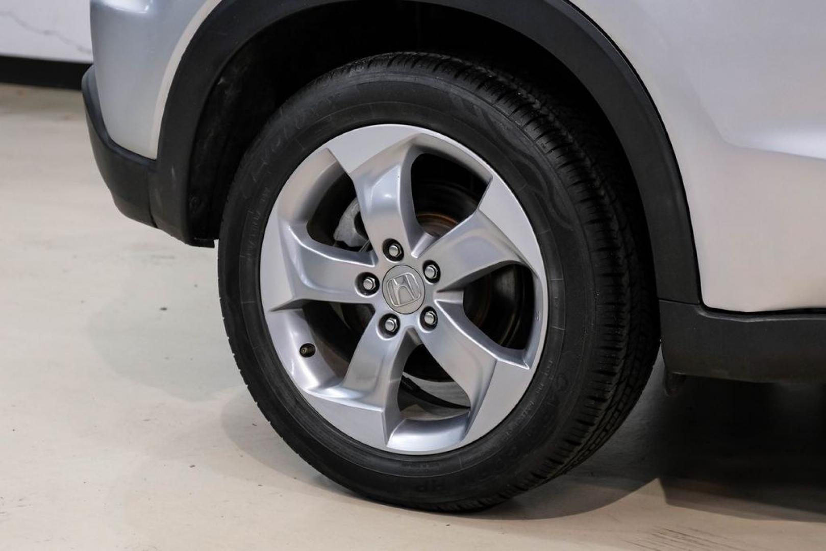 2016 Alabaster Silver Metallic /Black Honda HR-V EX-L (3CZRU5H76GM) with an 1.8L I4 SOHC 16V i-VTEC engine, CVT transmission, located at 15300 Midway Rd., Addison, TX, 75001, (972) 702-0011, 32.958321, -96.838074 - Photo#48