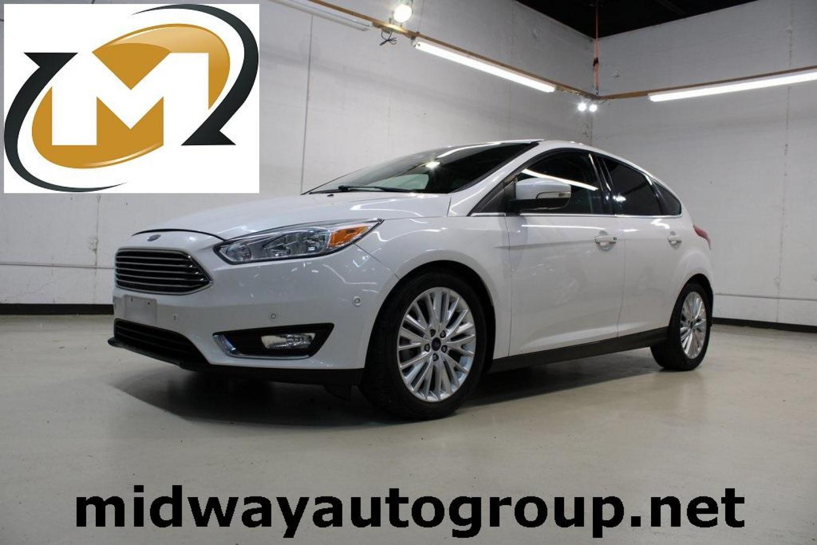 2017 White Platinum Clearcoat Metallic /Black Ford Focus Titanium (1FADP3N23HL) with an 2.0L I4 GDI Ti-VCT Flex Fuel engine, Automatic transmission, located at 15300 Midway Rd., Addison, TX, 75001, (972) 702-0011, 32.958321, -96.838074 - Photo#0