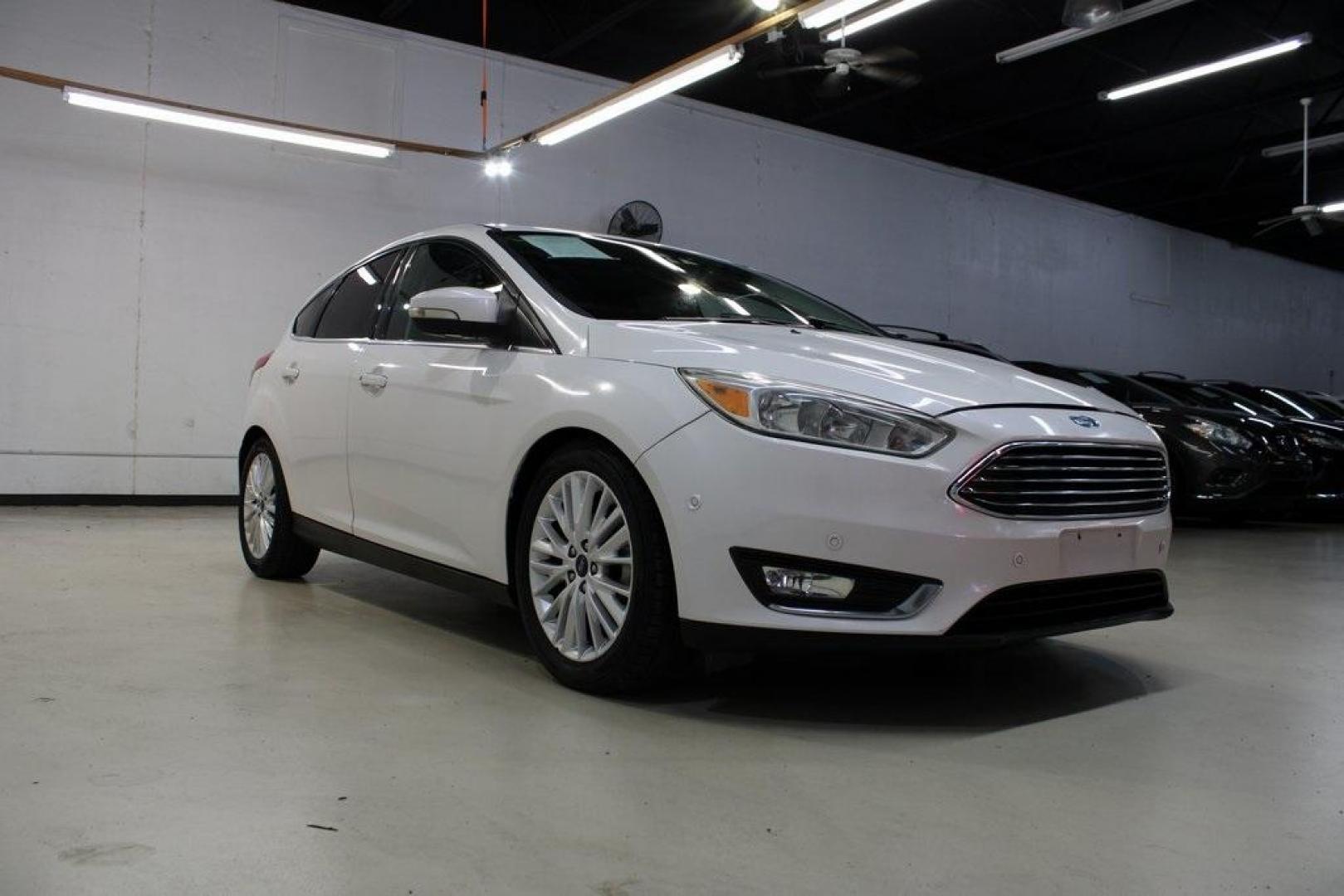 2017 White Platinum Clearcoat Metallic /Black Ford Focus Titanium (1FADP3N23HL) with an 2.0L I4 GDI Ti-VCT Flex Fuel engine, Automatic transmission, located at 15300 Midway Rd., Addison, TX, 75001, (972) 702-0011, 32.958321, -96.838074 - Photo#1