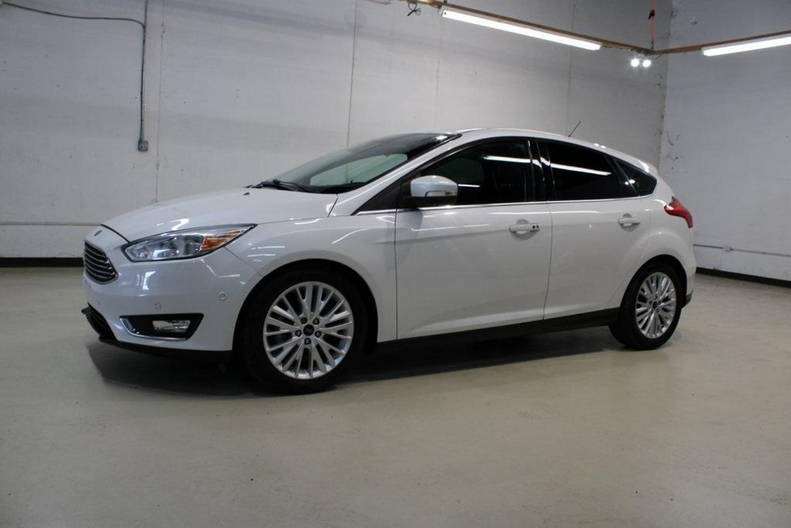 2017 White Platinum Clearcoat Metallic /Black Ford Focus Titanium (1FADP3N23HL) with an 2.0L I4 GDI Ti-VCT Flex Fuel engine, Automatic transmission, located at 15300 Midway Rd., Addison, TX, 75001, (972) 702-0011, 32.958321, -96.838074 - Photo#4