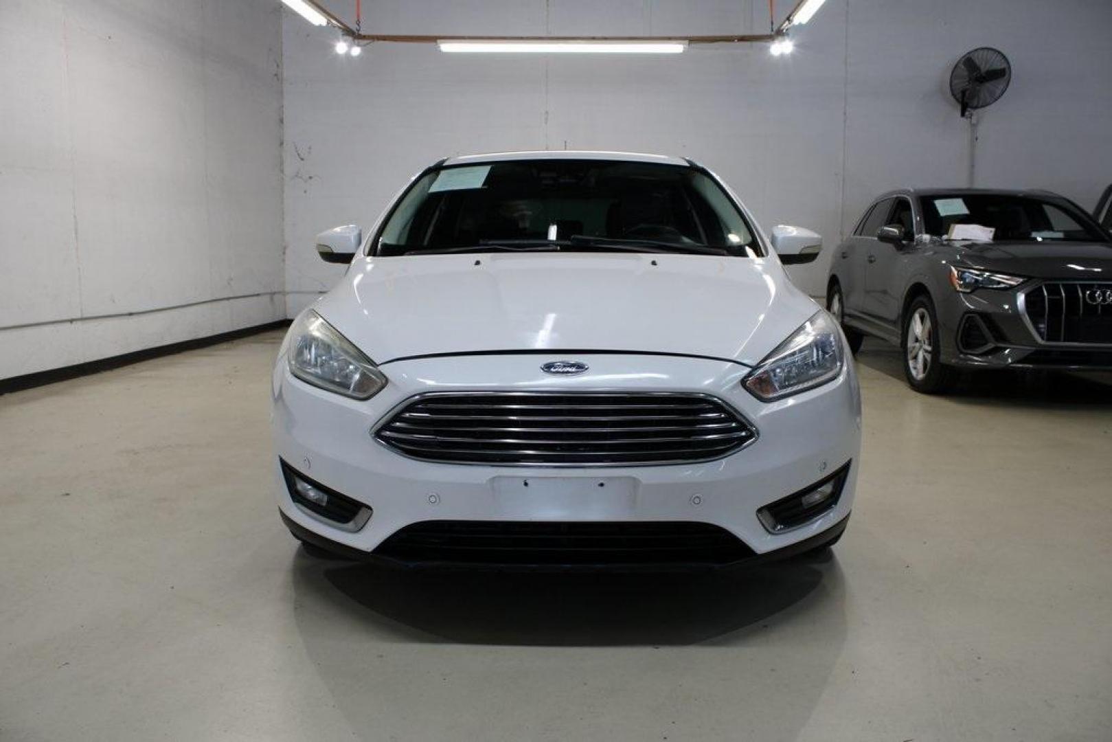 2017 White Platinum Clearcoat Metallic /Black Ford Focus Titanium (1FADP3N23HL) with an 2.0L I4 GDI Ti-VCT Flex Fuel engine, Automatic transmission, located at 15300 Midway Rd., Addison, TX, 75001, (972) 702-0011, 32.958321, -96.838074 - Photo#5