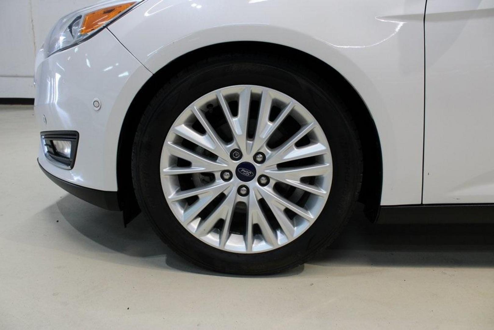 2017 White Platinum Clearcoat Metallic /Black Ford Focus Titanium (1FADP3N23HL) with an 2.0L I4 GDI Ti-VCT Flex Fuel engine, Automatic transmission, located at 15300 Midway Rd., Addison, TX, 75001, (972) 702-0011, 32.958321, -96.838074 - Photo#8