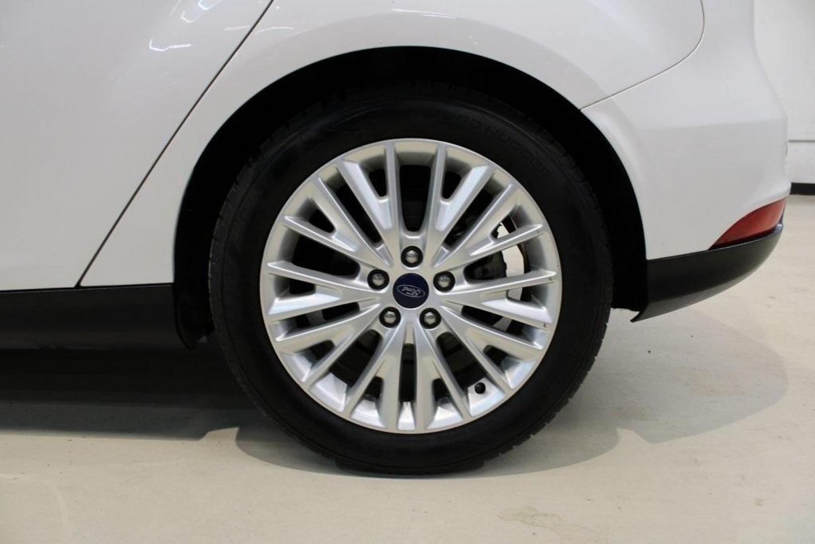2017 White Platinum Clearcoat Metallic /Black Ford Focus Titanium (1FADP3N23HL) with an 2.0L I4 GDI Ti-VCT Flex Fuel engine, Automatic transmission, located at 15300 Midway Rd., Addison, TX, 75001, (972) 702-0011, 32.958321, -96.838074 - Photo#9