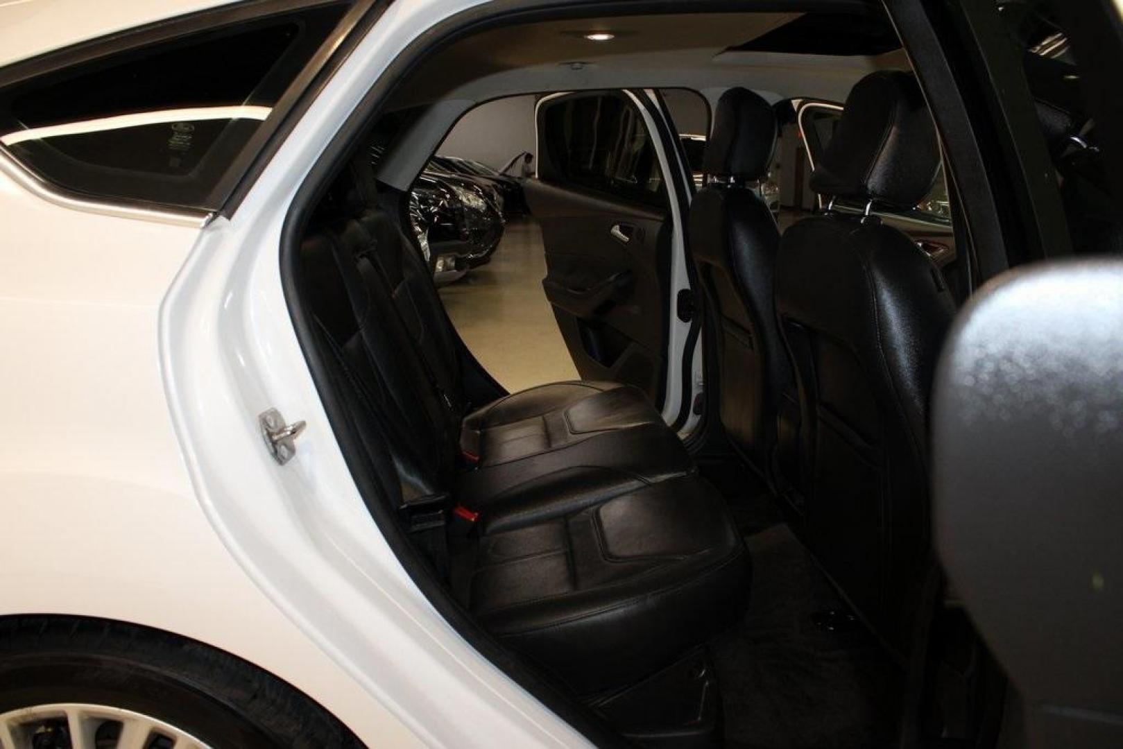 2017 White Platinum Clearcoat Metallic /Black Ford Focus Titanium (1FADP3N23HL) with an 2.0L I4 GDI Ti-VCT Flex Fuel engine, Automatic transmission, located at 15300 Midway Rd., Addison, TX, 75001, (972) 702-0011, 32.958321, -96.838074 - Photo#14