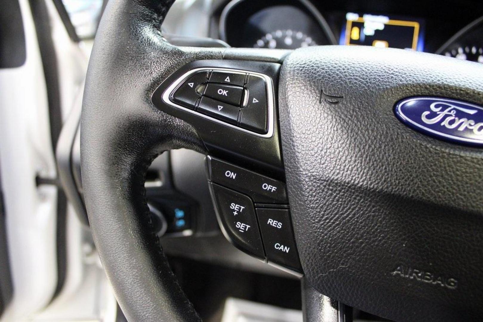 2017 White Platinum Clearcoat Metallic /Black Ford Focus Titanium (1FADP3N23HL) with an 2.0L I4 GDI Ti-VCT Flex Fuel engine, Automatic transmission, located at 15300 Midway Rd., Addison, TX, 75001, (972) 702-0011, 32.958321, -96.838074 - Photo#25
