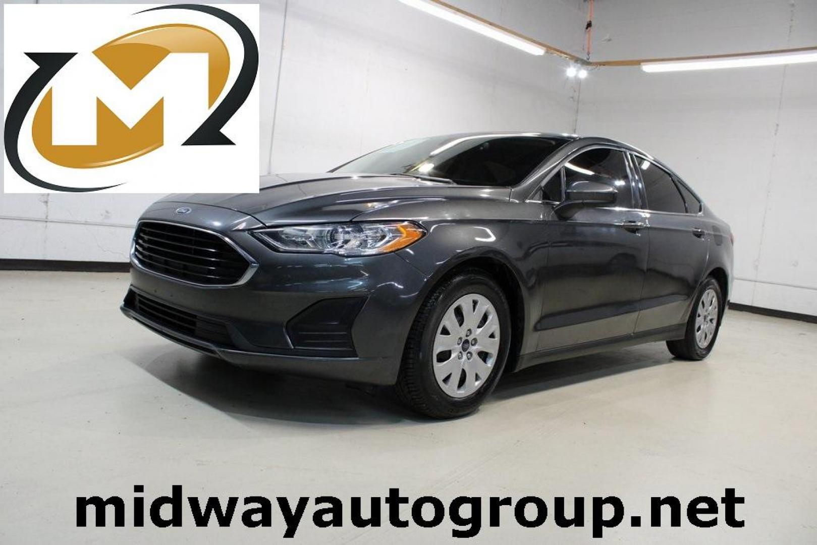 2020 Magnetic /Ebony Stone Ford Fusion S (3FA6P0G79LR) with an 2.5L iVCT engine, Automatic transmission, located at 15300 Midway Rd., Addison, TX, 75001, (972) 702-0011, 32.958321, -96.838074 - 2020 Ford Fusion S<br>Now Available at Midway Auto Group Addison, Texas<br><br>The 2020 Ford Fusion S delivers modern styling, a comfortable ride, and impressive efficiency, making it a standout choice for commuters and families alike. With advanced safety features, a roomy cabin, and Fords reliabi - Photo#0