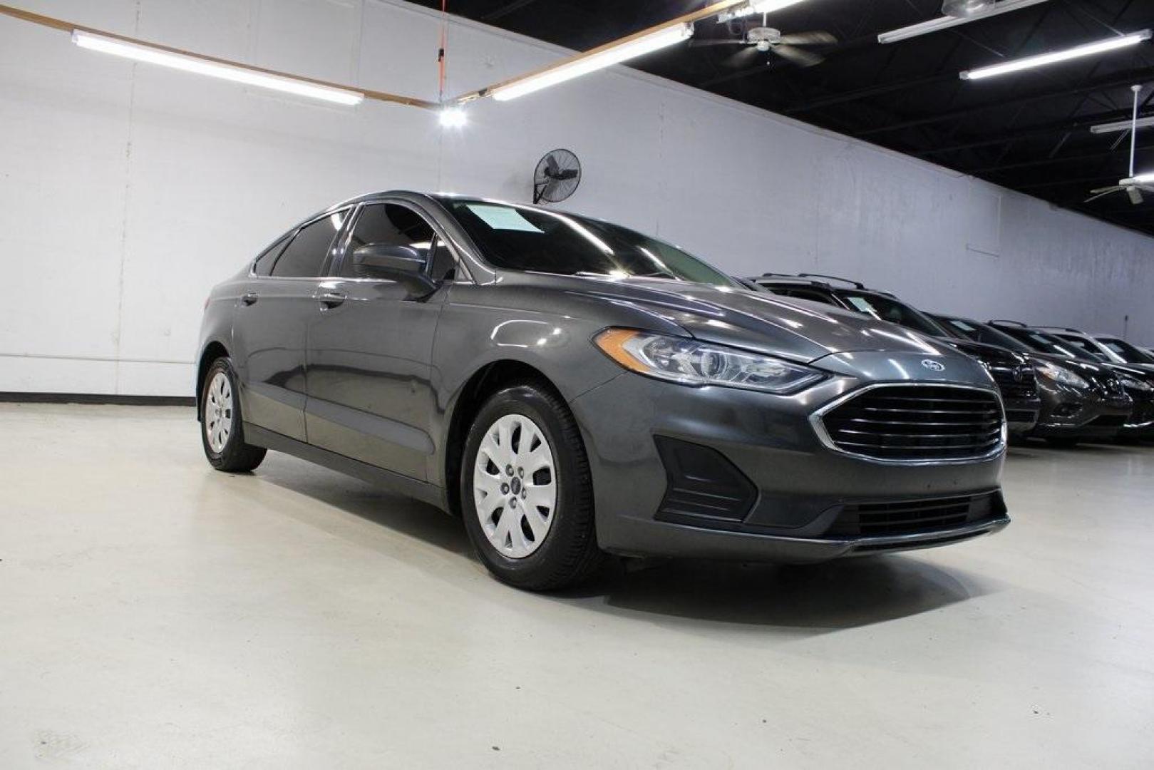 2020 Magnetic /Ebony Stone Ford Fusion S (3FA6P0G79LR) with an 2.5L iVCT engine, Automatic transmission, located at 15300 Midway Rd., Addison, TX, 75001, (972) 702-0011, 32.958321, -96.838074 - 2020 Ford Fusion S<br>Now Available at Midway Auto Group Addison, Texas<br><br>The 2020 Ford Fusion S delivers modern styling, a comfortable ride, and impressive efficiency, making it a standout choice for commuters and families alike. With advanced safety features, a roomy cabin, and Fords reliabi - Photo#1