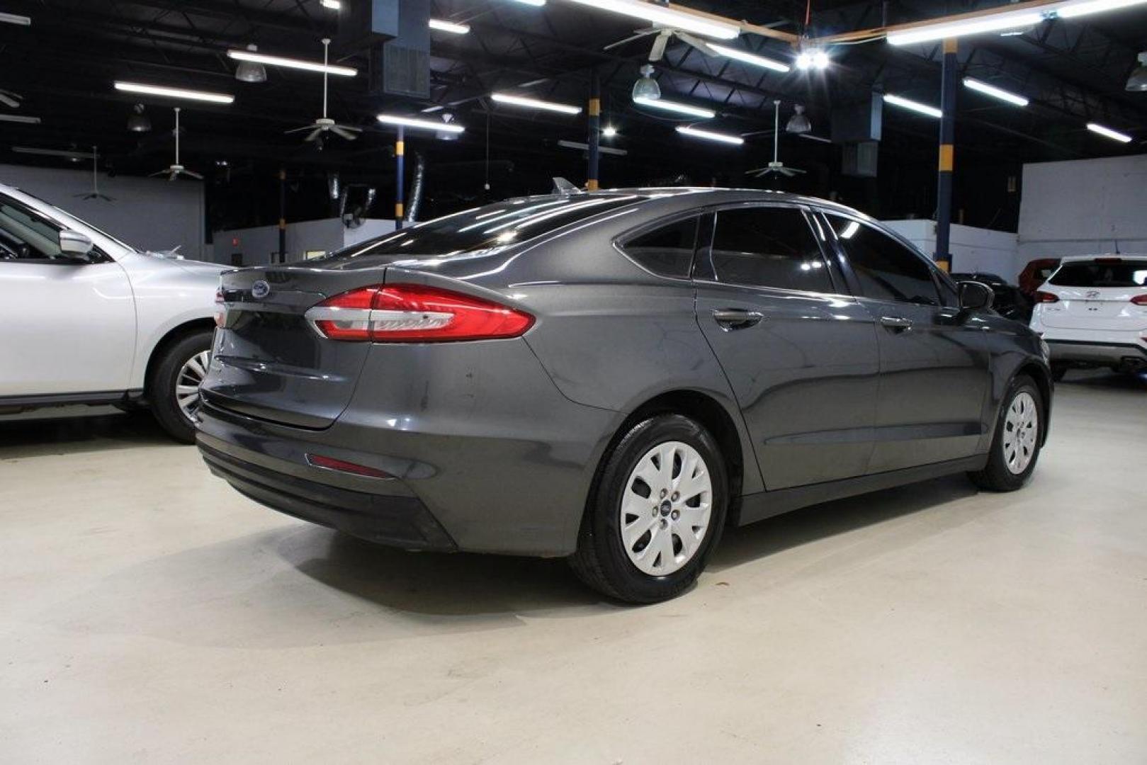 2020 Magnetic /Ebony Stone Ford Fusion S (3FA6P0G79LR) with an 2.5L iVCT engine, Automatic transmission, located at 15300 Midway Rd., Addison, TX, 75001, (972) 702-0011, 32.958321, -96.838074 - 2020 Ford Fusion S<br>Now Available at Midway Auto Group Addison, Texas<br><br>The 2020 Ford Fusion S delivers modern styling, a comfortable ride, and impressive efficiency, making it a standout choice for commuters and families alike. With advanced safety features, a roomy cabin, and Fords reliabi - Photo#2