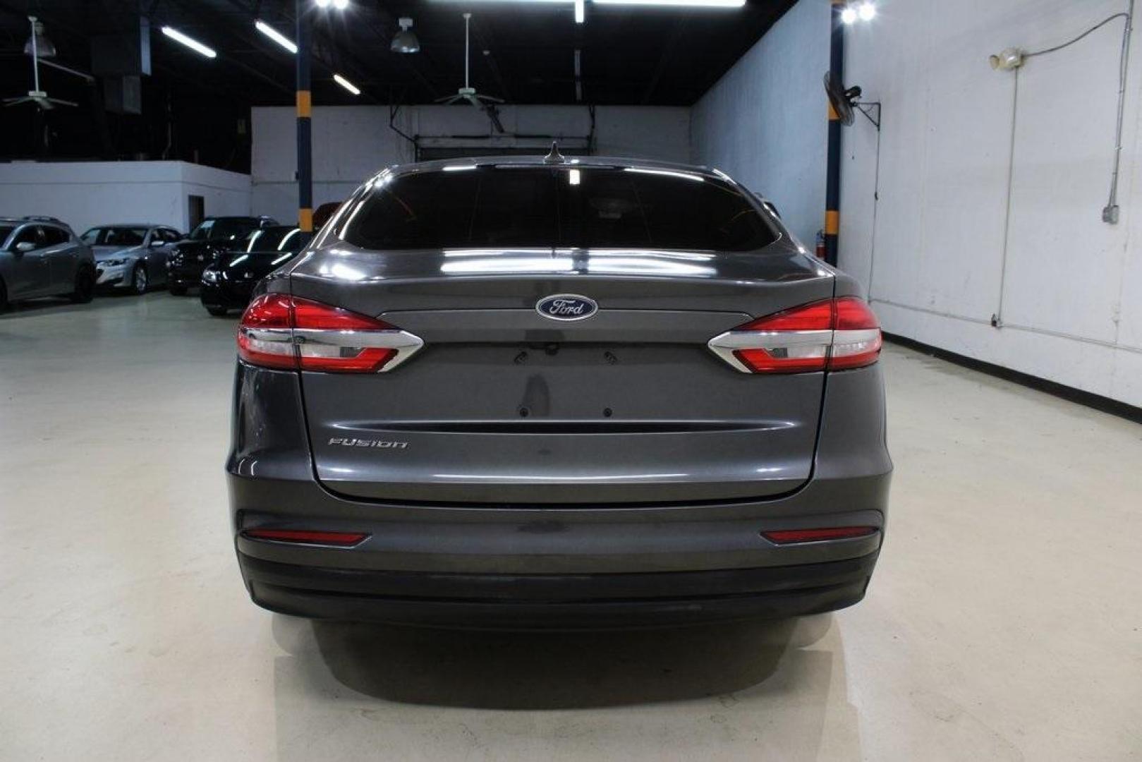 2020 Magnetic /Ebony Stone Ford Fusion S (3FA6P0G79LR) with an 2.5L iVCT engine, Automatic transmission, located at 15300 Midway Rd., Addison, TX, 75001, (972) 702-0011, 32.958321, -96.838074 - 2020 Ford Fusion S<br>Now Available at Midway Auto Group Addison, Texas<br><br>The 2020 Ford Fusion S delivers modern styling, a comfortable ride, and impressive efficiency, making it a standout choice for commuters and families alike. With advanced safety features, a roomy cabin, and Fords reliabi - Photo#7