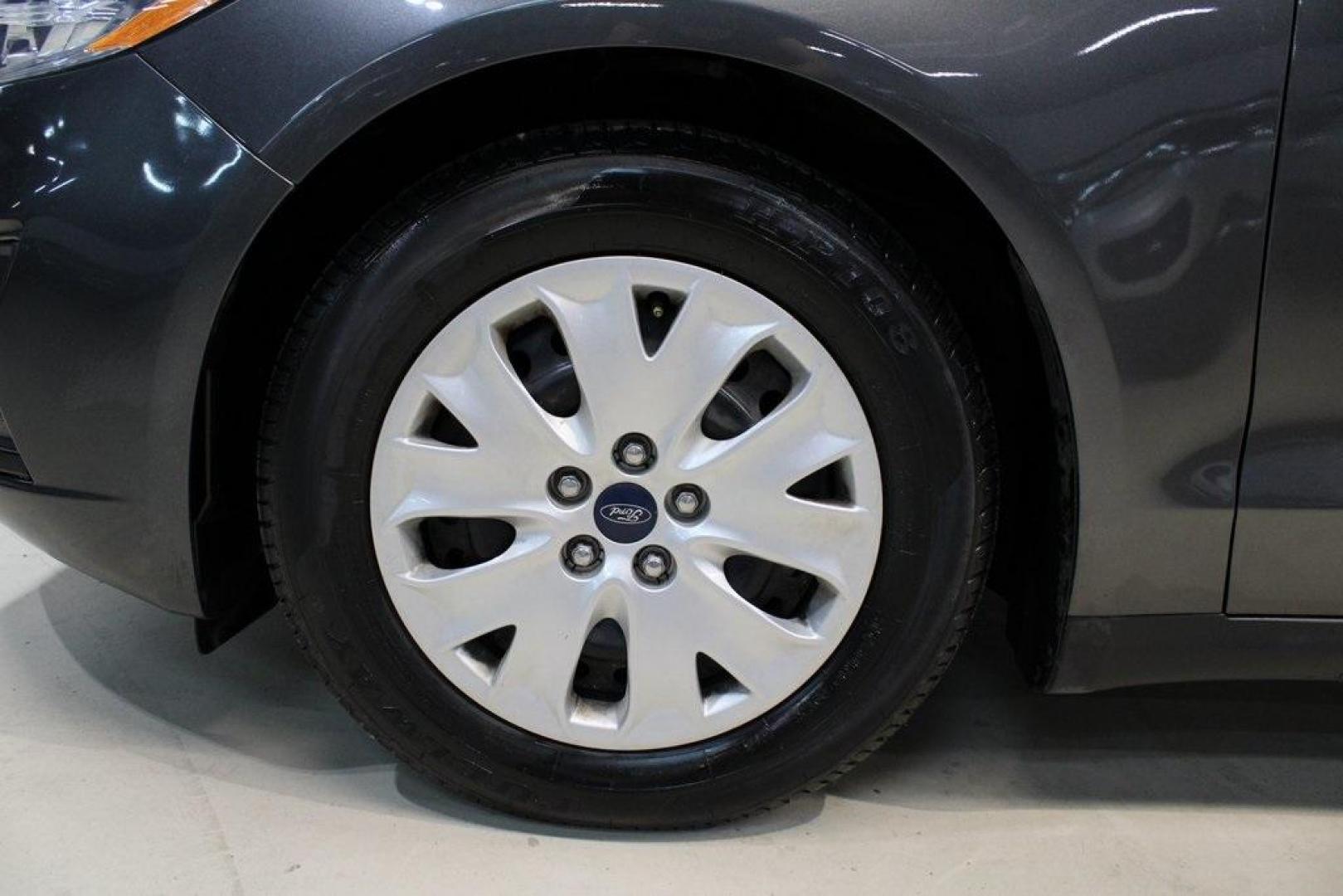 2020 Magnetic /Ebony Stone Ford Fusion S (3FA6P0G79LR) with an 2.5L iVCT engine, Automatic transmission, located at 15300 Midway Rd., Addison, TX, 75001, (972) 702-0011, 32.958321, -96.838074 - 2020 Ford Fusion S<br>Now Available at Midway Auto Group Addison, Texas<br><br>The 2020 Ford Fusion S delivers modern styling, a comfortable ride, and impressive efficiency, making it a standout choice for commuters and families alike. With advanced safety features, a roomy cabin, and Fords reliabi - Photo#8