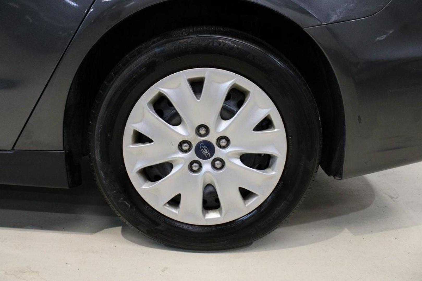 2020 Magnetic /Ebony Stone Ford Fusion S (3FA6P0G79LR) with an 2.5L iVCT engine, Automatic transmission, located at 15300 Midway Rd., Addison, TX, 75001, (972) 702-0011, 32.958321, -96.838074 - 2020 Ford Fusion S<br>Now Available at Midway Auto Group Addison, Texas<br><br>The 2020 Ford Fusion S delivers modern styling, a comfortable ride, and impressive efficiency, making it a standout choice for commuters and families alike. With advanced safety features, a roomy cabin, and Fords reliabi - Photo#9