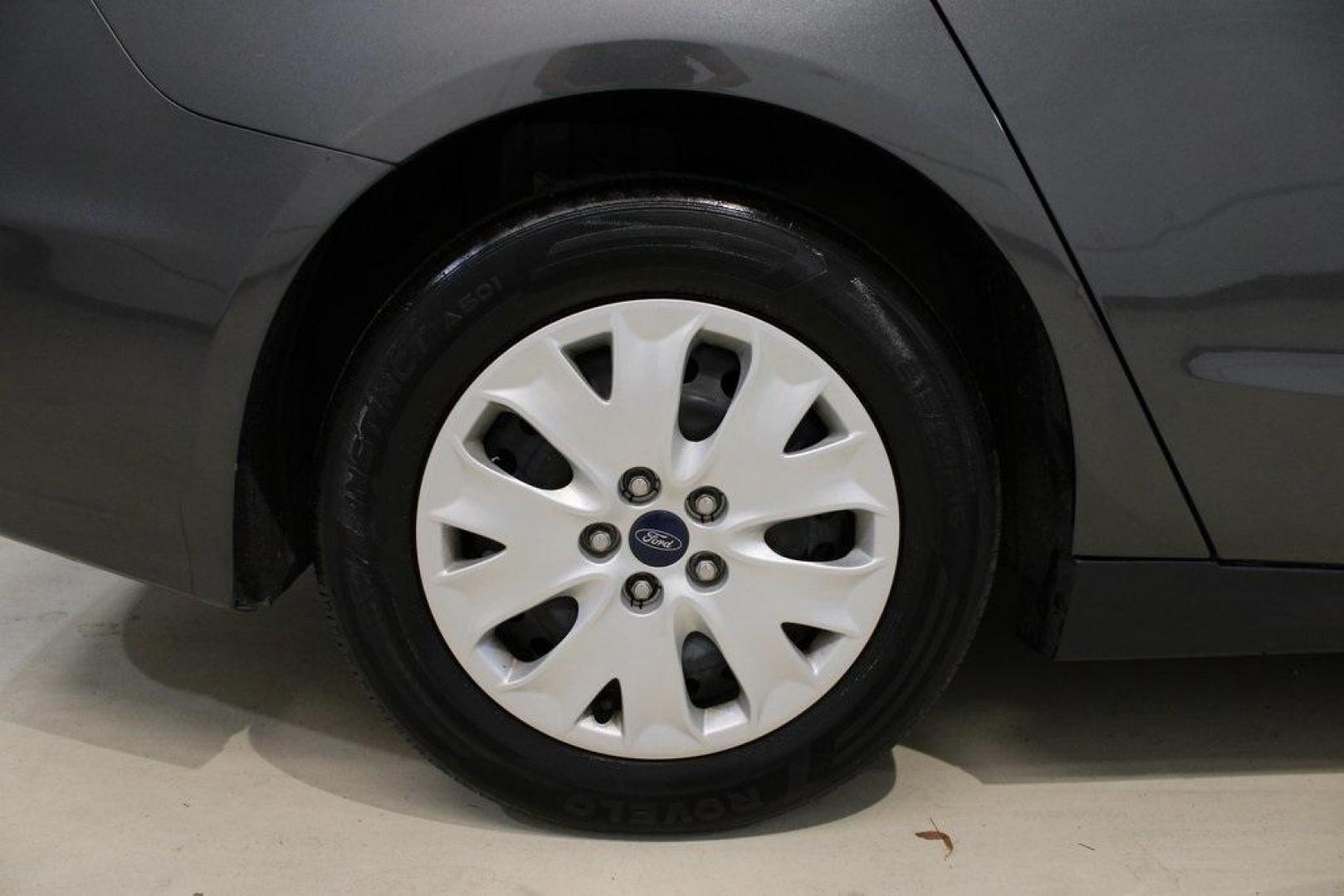 2020 Magnetic /Ebony Stone Ford Fusion S (3FA6P0G79LR) with an 2.5L iVCT engine, Automatic transmission, located at 15300 Midway Rd., Addison, TX, 75001, (972) 702-0011, 32.958321, -96.838074 - 2020 Ford Fusion S<br>Now Available at Midway Auto Group Addison, Texas<br><br>The 2020 Ford Fusion S delivers modern styling, a comfortable ride, and impressive efficiency, making it a standout choice for commuters and families alike. With advanced safety features, a roomy cabin, and Fords reliabi - Photo#10