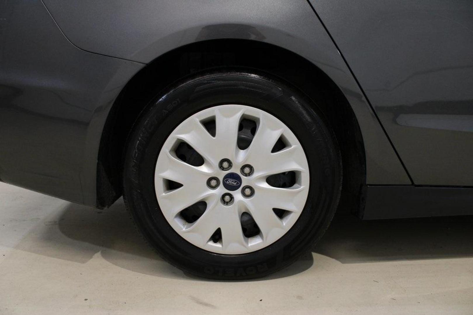 2020 Magnetic /Ebony Stone Ford Fusion S (3FA6P0G79LR) with an 2.5L iVCT engine, Automatic transmission, located at 15300 Midway Rd., Addison, TX, 75001, (972) 702-0011, 32.958321, -96.838074 - 2020 Ford Fusion S<br>Now Available at Midway Auto Group Addison, Texas<br><br>The 2020 Ford Fusion S delivers modern styling, a comfortable ride, and impressive efficiency, making it a standout choice for commuters and families alike. With advanced safety features, a roomy cabin, and Fords reliabi - Photo#11