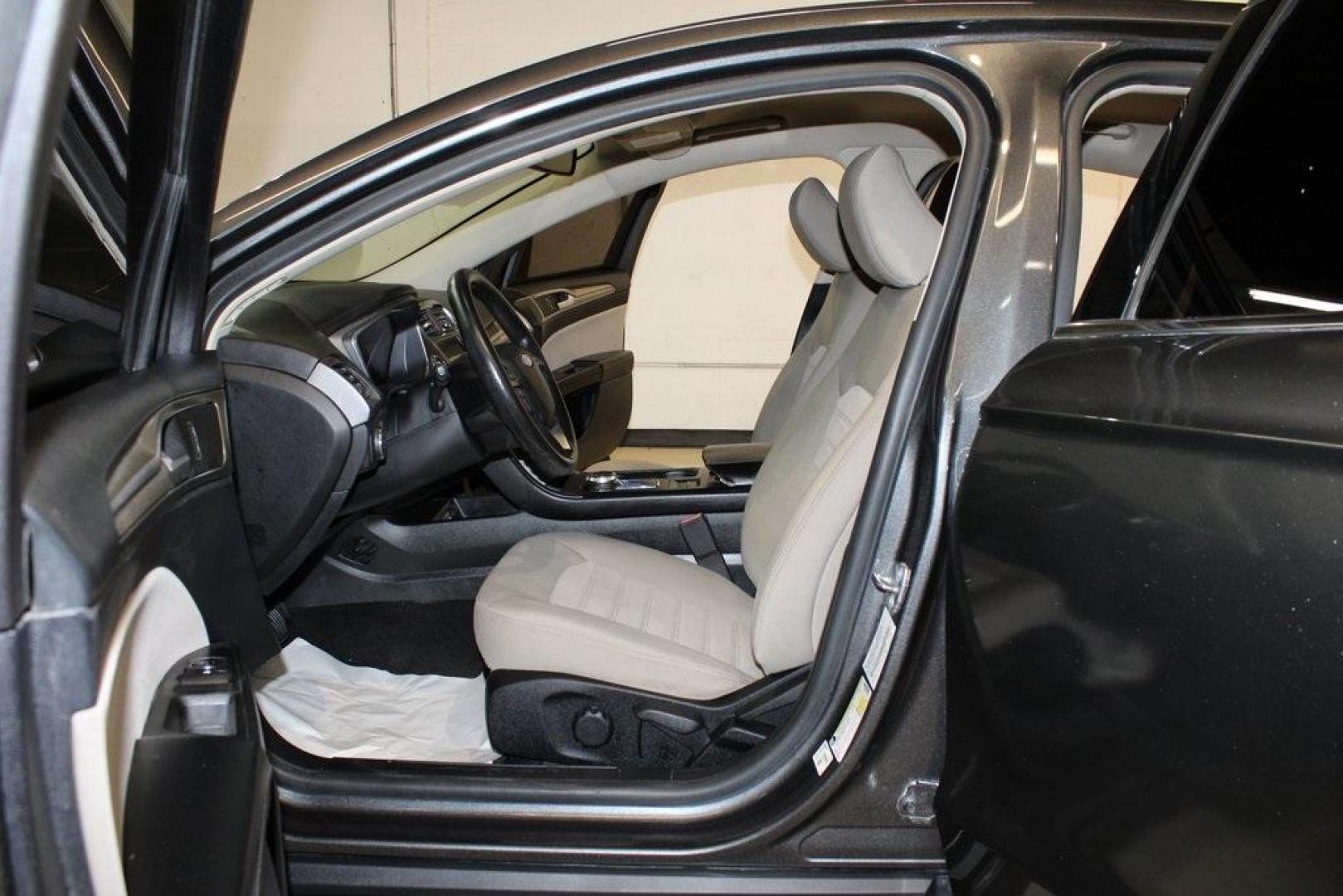 2020 Magnetic /Ebony Stone Ford Fusion S (3FA6P0G79LR) with an 2.5L iVCT engine, Automatic transmission, located at 15300 Midway Rd., Addison, TX, 75001, (972) 702-0011, 32.958321, -96.838074 - 2020 Ford Fusion S<br>Now Available at Midway Auto Group Addison, Texas<br><br>The 2020 Ford Fusion S delivers modern styling, a comfortable ride, and impressive efficiency, making it a standout choice for commuters and families alike. With advanced safety features, a roomy cabin, and Fords reliabi - Photo#13