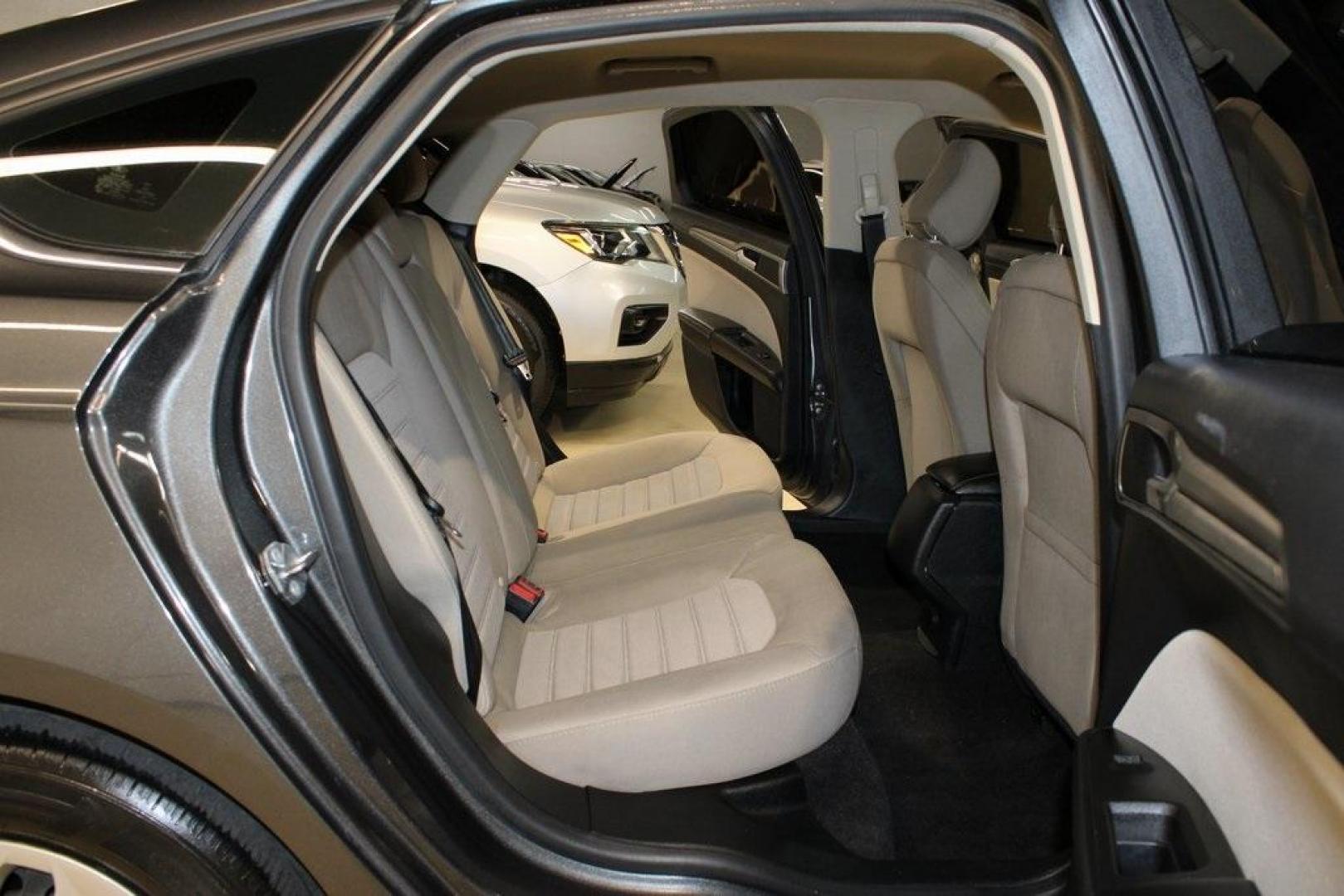 2020 Magnetic /Ebony Stone Ford Fusion S (3FA6P0G79LR) with an 2.5L iVCT engine, Automatic transmission, located at 15300 Midway Rd., Addison, TX, 75001, (972) 702-0011, 32.958321, -96.838074 - 2020 Ford Fusion S<br>Now Available at Midway Auto Group Addison, Texas<br><br>The 2020 Ford Fusion S delivers modern styling, a comfortable ride, and impressive efficiency, making it a standout choice for commuters and families alike. With advanced safety features, a roomy cabin, and Fords reliabi - Photo#15