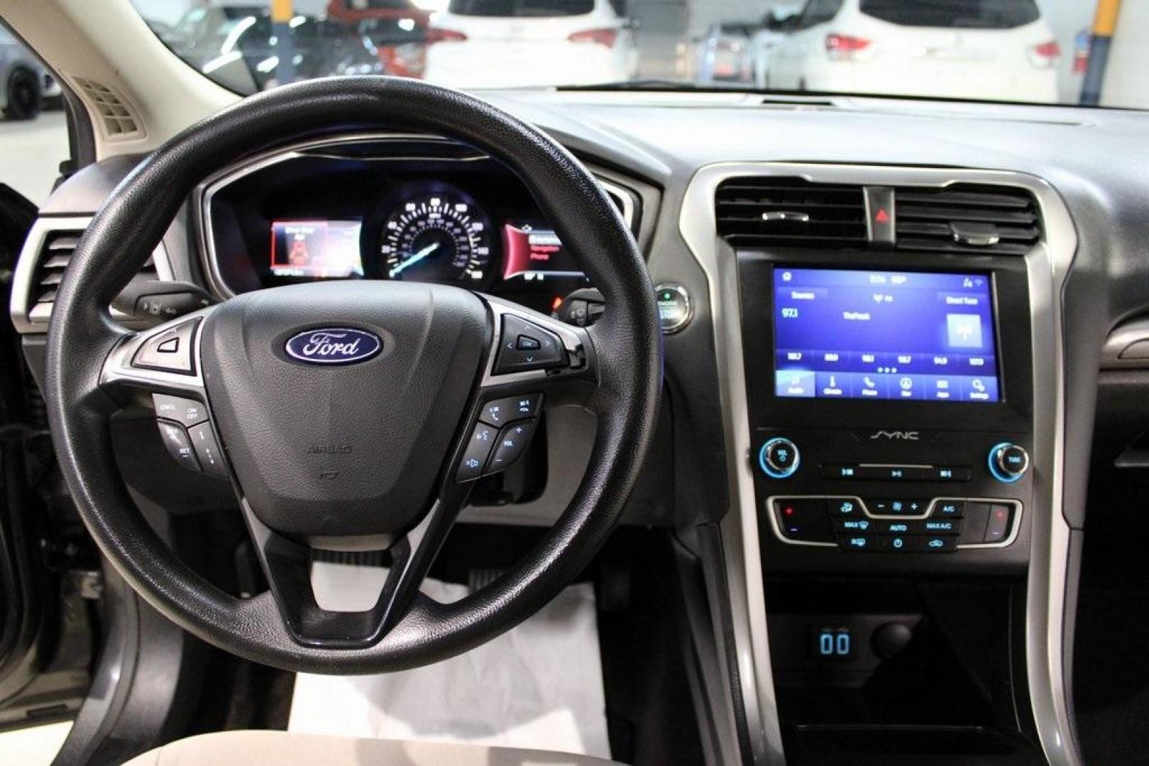 2020 Magnetic /Ebony Stone Ford Fusion S (3FA6P0G79LR) with an 2.5L iVCT engine, Automatic transmission, located at 15300 Midway Rd., Addison, TX, 75001, (972) 702-0011, 32.958321, -96.838074 - 2020 Ford Fusion S<br>Now Available at Midway Auto Group Addison, Texas<br><br>The 2020 Ford Fusion S delivers modern styling, a comfortable ride, and impressive efficiency, making it a standout choice for commuters and families alike. With advanced safety features, a roomy cabin, and Fords reliabi - Photo#17
