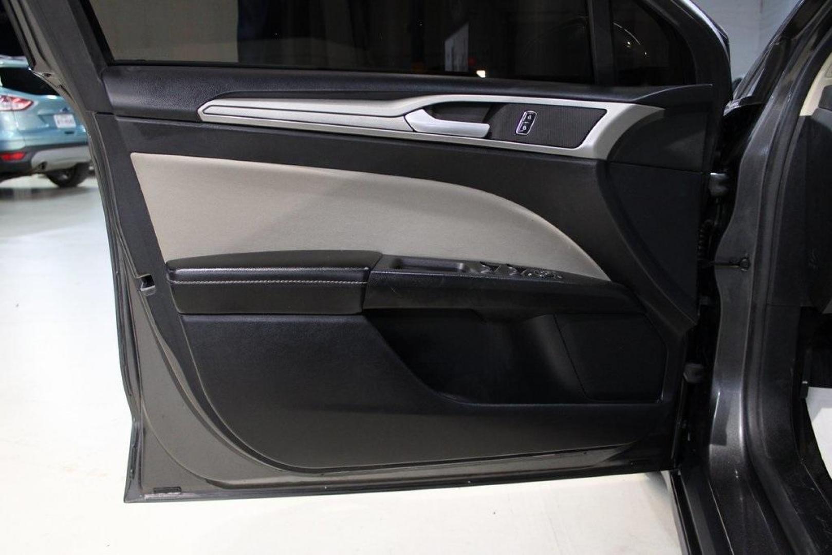 2020 Magnetic /Ebony Stone Ford Fusion S (3FA6P0G79LR) with an 2.5L iVCT engine, Automatic transmission, located at 15300 Midway Rd., Addison, TX, 75001, (972) 702-0011, 32.958321, -96.838074 - 2020 Ford Fusion S<br>Now Available at Midway Auto Group Addison, Texas<br><br>The 2020 Ford Fusion S delivers modern styling, a comfortable ride, and impressive efficiency, making it a standout choice for commuters and families alike. With advanced safety features, a roomy cabin, and Fords reliabi - Photo#26