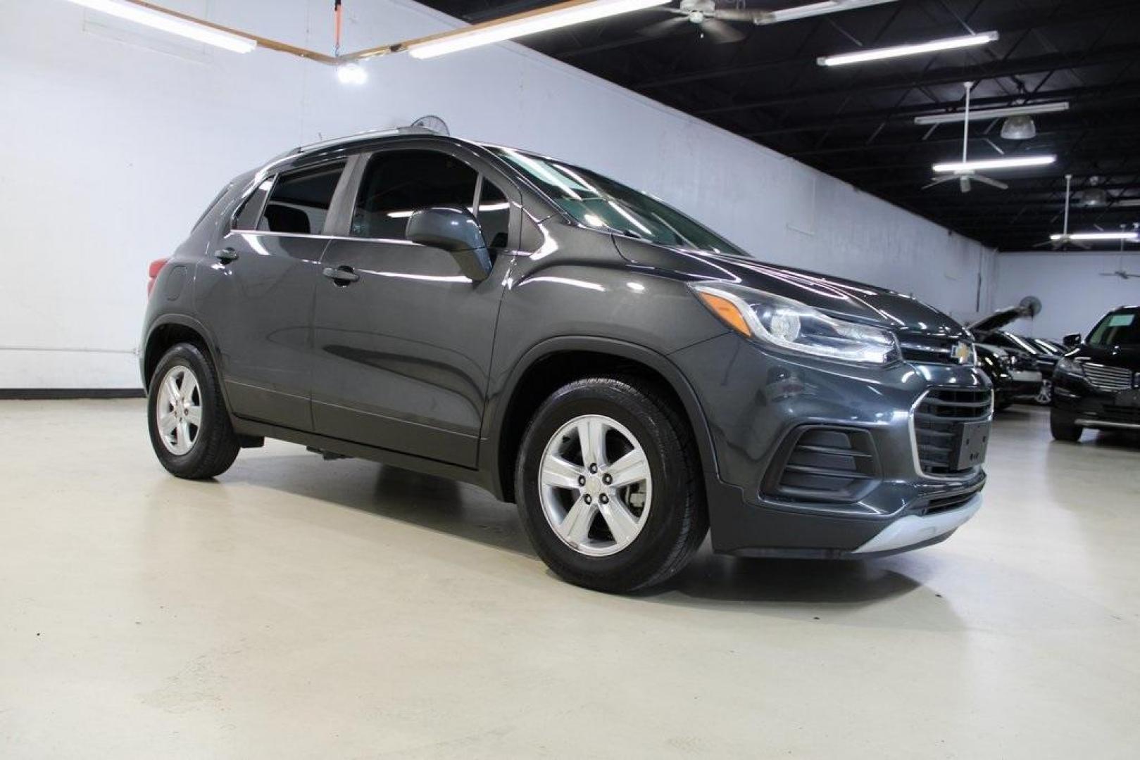 2017 Nightfall Gray Metallic /Jet Black Chevrolet Trax LT (3GNCJLSB3HL) with an ECOTEC 1.4L I4 SMPI DOHC Turbocharged VVT engine, Automatic transmission, located at 15300 Midway Rd., Addison, TX, 75001, (972) 702-0011, 32.958321, -96.838074 - 2017 Chevrolet Trax LT<br>Now Available at Midway Auto Group, Addison, Texas<br><br>Compact, versatile, and city-friendly, the 2017 Chevrolet Trax LT is designed for drivers who want SUV utility in an agile, fuel-efficient package. With its modern tech, comfortable interior, and confident performanc - Photo#1