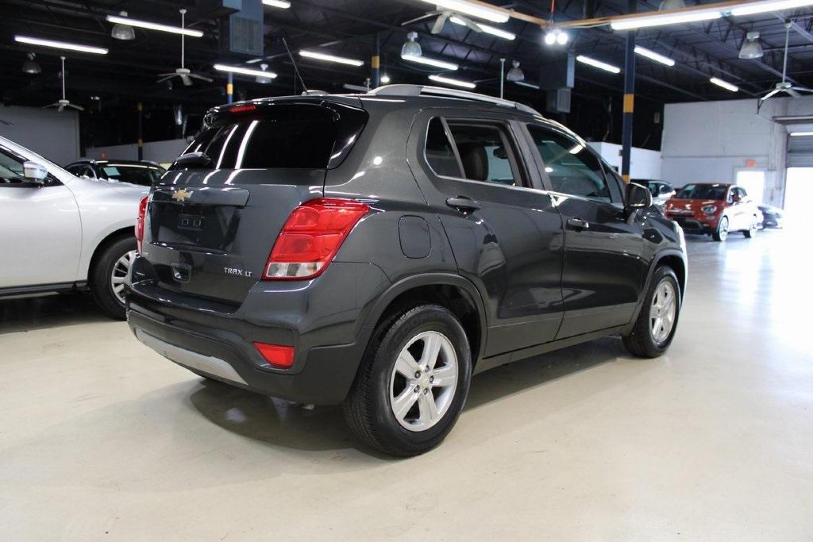 2017 Nightfall Gray Metallic /Jet Black Chevrolet Trax LT (3GNCJLSB3HL) with an ECOTEC 1.4L I4 SMPI DOHC Turbocharged VVT engine, Automatic transmission, located at 15300 Midway Rd., Addison, TX, 75001, (972) 702-0011, 32.958321, -96.838074 - 2017 Chevrolet Trax LT<br>Now Available at Midway Auto Group, Addison, Texas<br><br>Compact, versatile, and city-friendly, the 2017 Chevrolet Trax LT is designed for drivers who want SUV utility in an agile, fuel-efficient package. With its modern tech, comfortable interior, and confident performanc - Photo#2