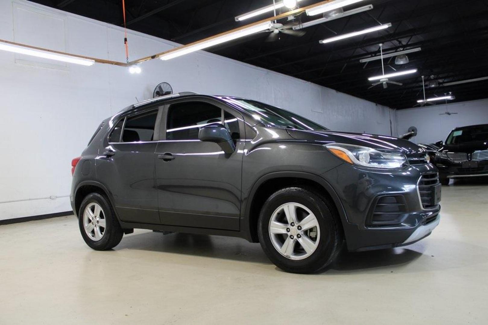 2017 Nightfall Gray Metallic /Jet Black Chevrolet Trax LT (3GNCJLSB3HL) with an ECOTEC 1.4L I4 SMPI DOHC Turbocharged VVT engine, Automatic transmission, located at 15300 Midway Rd., Addison, TX, 75001, (972) 702-0011, 32.958321, -96.838074 - 2017 Chevrolet Trax LT<br>Now Available at Midway Auto Group, Addison, Texas<br><br>Compact, versatile, and city-friendly, the 2017 Chevrolet Trax LT is designed for drivers who want SUV utility in an agile, fuel-efficient package. With its modern tech, comfortable interior, and confident performanc - Photo#6