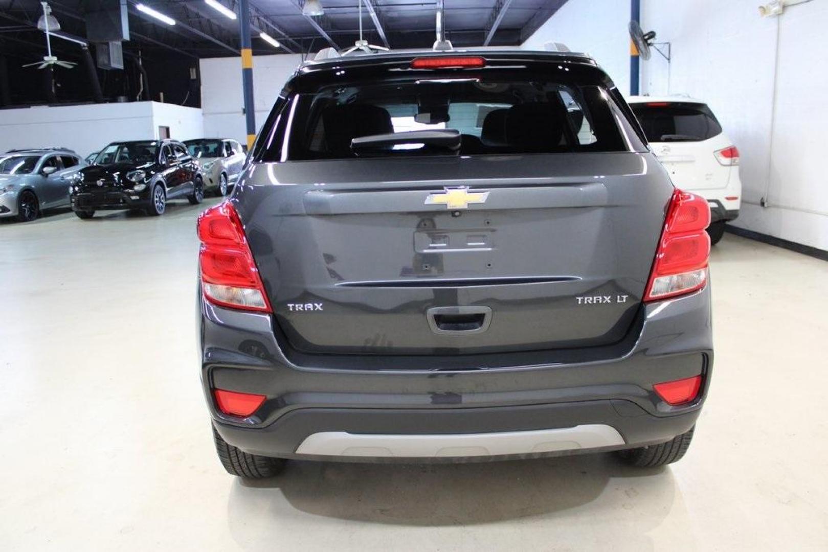 2017 Nightfall Gray Metallic /Jet Black Chevrolet Trax LT (3GNCJLSB3HL) with an ECOTEC 1.4L I4 SMPI DOHC Turbocharged VVT engine, Automatic transmission, located at 15300 Midway Rd., Addison, TX, 75001, (972) 702-0011, 32.958321, -96.838074 - 2017 Chevrolet Trax LT<br>Now Available at Midway Auto Group, Addison, Texas<br><br>Compact, versatile, and city-friendly, the 2017 Chevrolet Trax LT is designed for drivers who want SUV utility in an agile, fuel-efficient package. With its modern tech, comfortable interior, and confident performanc - Photo#7