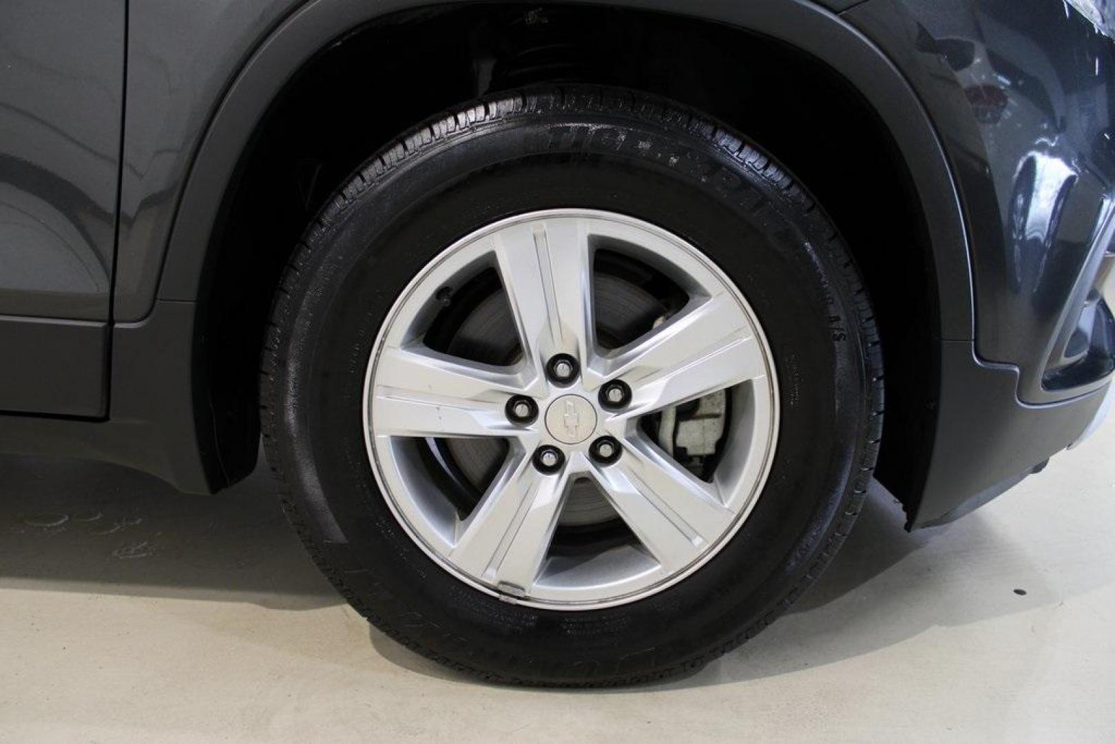2017 Nightfall Gray Metallic /Jet Black Chevrolet Trax LT (3GNCJLSB3HL) with an ECOTEC 1.4L I4 SMPI DOHC Turbocharged VVT engine, Automatic transmission, located at 15300 Midway Rd., Addison, TX, 75001, (972) 702-0011, 32.958321, -96.838074 - 2017 Chevrolet Trax LT<br>Now Available at Midway Auto Group, Addison, Texas<br><br>Compact, versatile, and city-friendly, the 2017 Chevrolet Trax LT is designed for drivers who want SUV utility in an agile, fuel-efficient package. With its modern tech, comfortable interior, and confident performanc - Photo#11