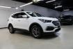 2018 Pearl White /Gray Hyundai Santa Fe Sport 2.4 Base (5XYZT3LB5JG) with an 2.4L I4 DGI DOHC 16V engine, Automatic transmission, located at 15300 Midway Rd., Addison, TX, 75001, (972) 702-0011, 32.958321, -96.838074 - 2018 Hyundai Santa Fe Sport<br>Now Available at Midway Auto Group Addison, Texas<br><br>Spacious, stylish, and versatile, the 2018 Hyundai Santa Fe Sport is a midsize SUV designed to handle daily commutes, weekend getaways, and everything in between. With a comfortable cabin, modern technology, and - Photo#6