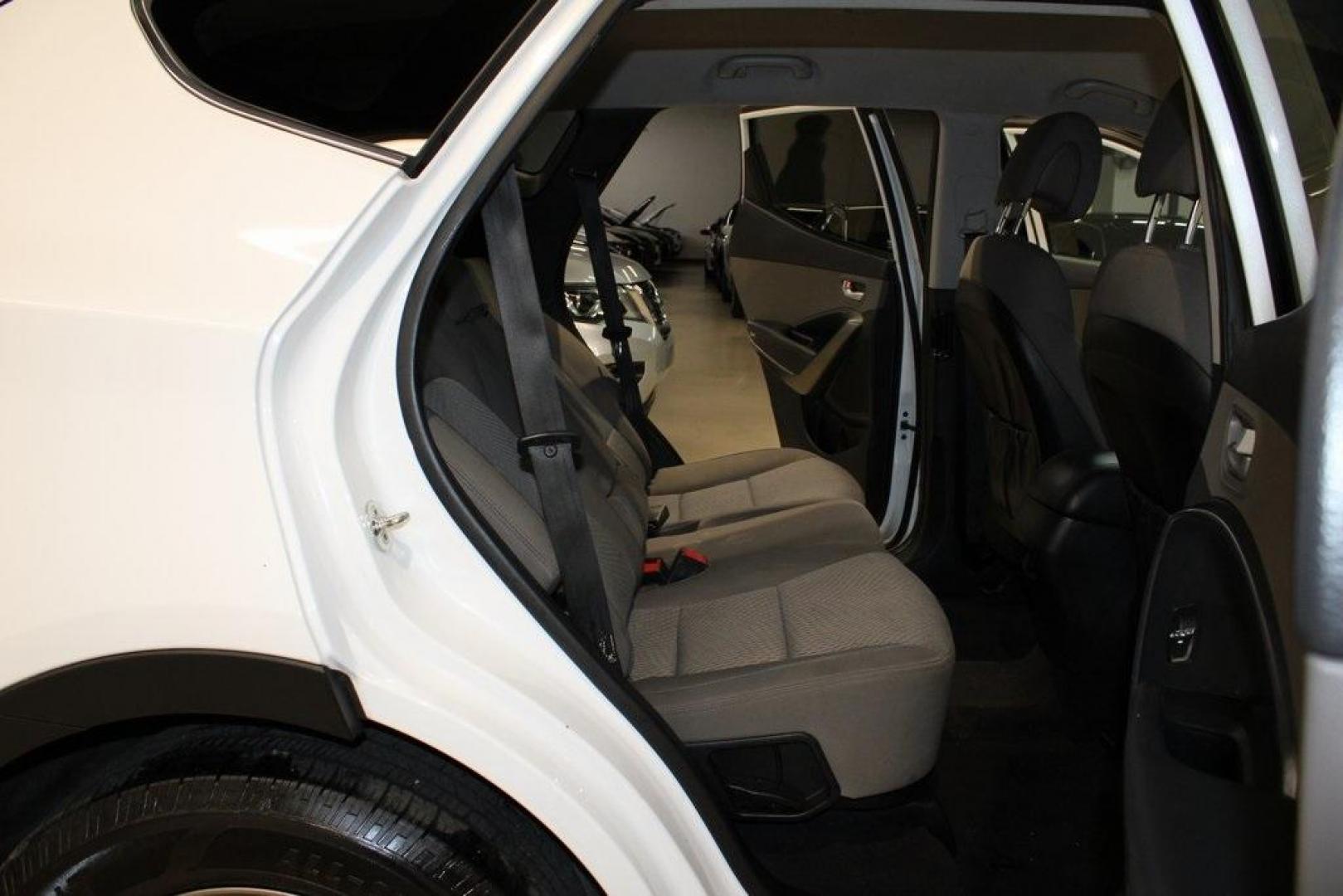 2018 Pearl White /Gray Hyundai Santa Fe Sport 2.4 Base (5XYZT3LB5JG) with an 2.4L I4 DGI DOHC 16V engine, Automatic transmission, located at 15300 Midway Rd., Addison, TX, 75001, (972) 702-0011, 32.958321, -96.838074 - 2018 Hyundai Santa Fe Sport<br>Now Available at Midway Auto Group Addison, Texas<br><br>Spacious, stylish, and versatile, the 2018 Hyundai Santa Fe Sport is a midsize SUV designed to handle daily commutes, weekend getaways, and everything in between. With a comfortable cabin, modern technology, and - Photo#15