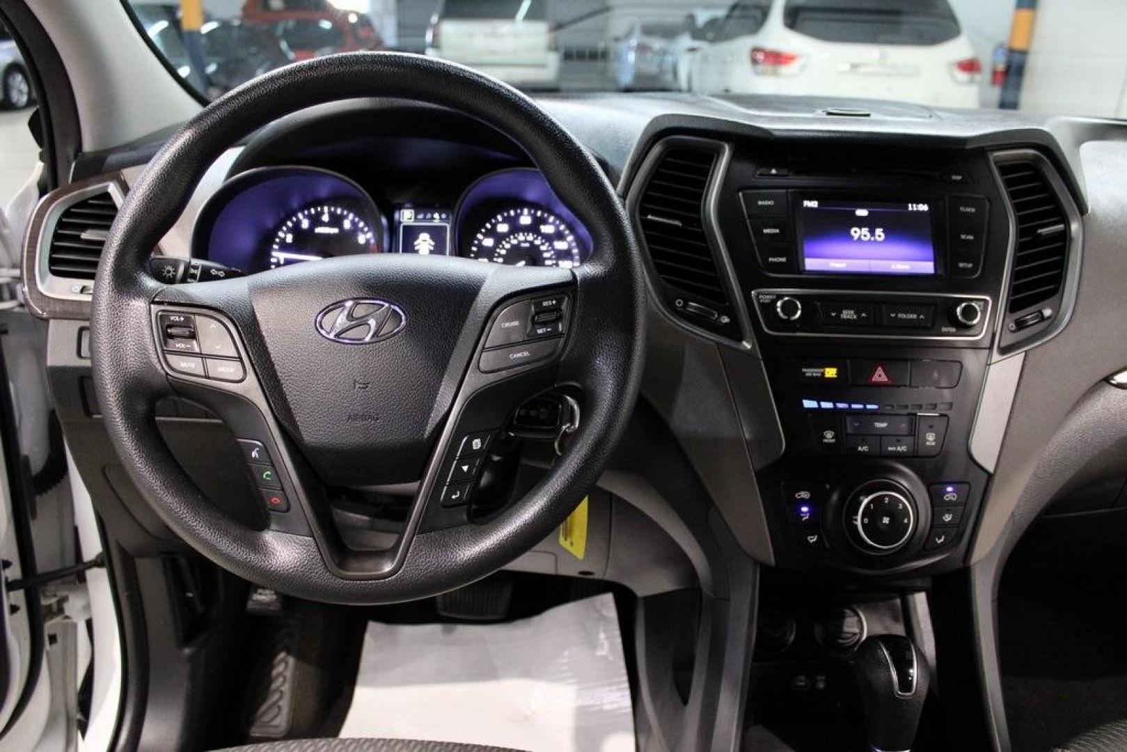 2018 Pearl White /Gray Hyundai Santa Fe Sport 2.4 Base (5XYZT3LB5JG) with an 2.4L I4 DGI DOHC 16V engine, Automatic transmission, located at 15300 Midway Rd., Addison, TX, 75001, (972) 702-0011, 32.958321, -96.838074 - 2018 Hyundai Santa Fe Sport<br>Now Available at Midway Auto Group Addison, Texas<br><br>Spacious, stylish, and versatile, the 2018 Hyundai Santa Fe Sport is a midsize SUV designed to handle daily commutes, weekend getaways, and everything in between. With a comfortable cabin, modern technology, and - Photo#17