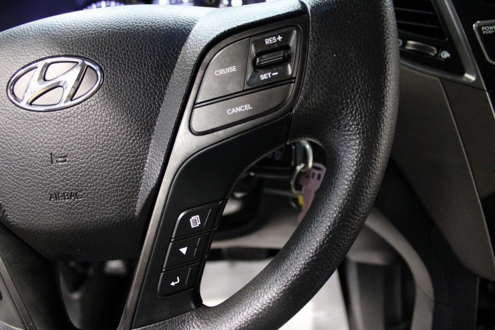 2018 Pearl White /Gray Hyundai Santa Fe Sport 2.4 Base (5XYZT3LB5JG) with an 2.4L I4 DGI DOHC 16V engine, Automatic transmission, located at 15300 Midway Rd., Addison, TX, 75001, (972) 702-0011, 32.958321, -96.838074 - 2018 Hyundai Santa Fe Sport<br>Now Available at Midway Auto Group Addison, Texas<br><br>Spacious, stylish, and versatile, the 2018 Hyundai Santa Fe Sport is a midsize SUV designed to handle daily commutes, weekend getaways, and everything in between. With a comfortable cabin, modern technology, and - Photo#22