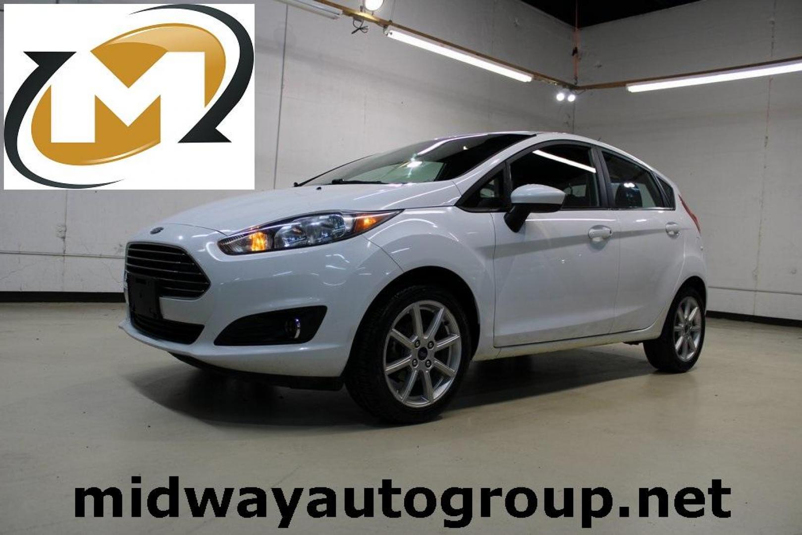 2019 Oxford White /Black Ford Fiesta SE (3FADP4EJXKM) with an 1.6L I4 Ti-VCT engine, Automatic transmission, located at 15300 Midway Rd., Addison, TX, 75001, (972) 702-0011, 32.958321, -96.838074 - Photo#0