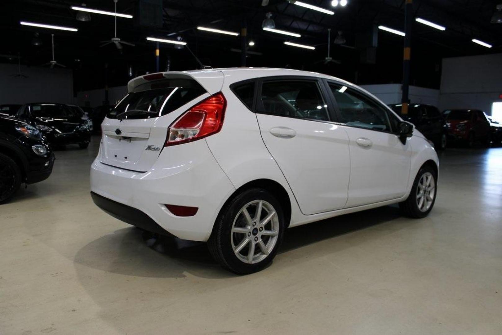 2019 Oxford White /Black Ford Fiesta SE (3FADP4EJXKM) with an 1.6L I4 Ti-VCT engine, Automatic transmission, located at 15300 Midway Rd., Addison, TX, 75001, (972) 702-0011, 32.958321, -96.838074 - Photo#1