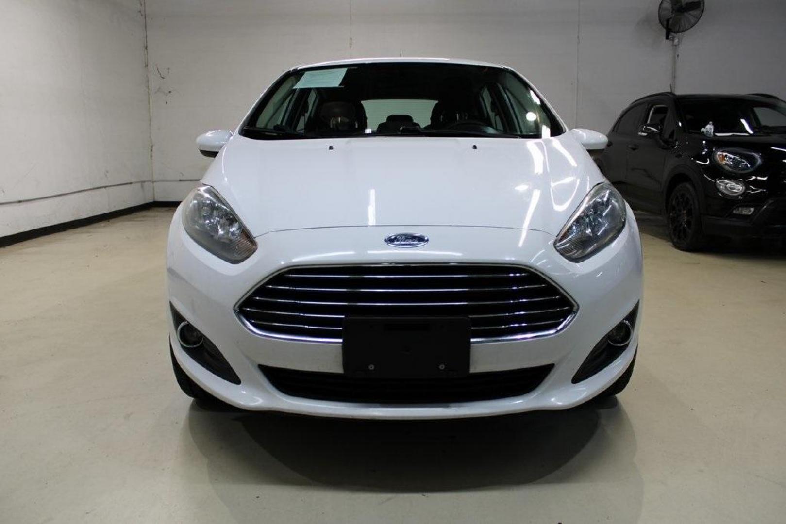 2019 Oxford White /Black Ford Fiesta SE (3FADP4EJXKM) with an 1.6L I4 Ti-VCT engine, Automatic transmission, located at 15300 Midway Rd., Addison, TX, 75001, (972) 702-0011, 32.958321, -96.838074 - Photo#4