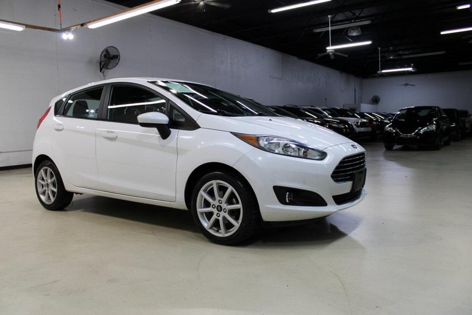 2019 Oxford White /Black Ford Fiesta SE (3FADP4EJXKM) with an 1.6L I4 Ti-VCT engine, Automatic transmission, located at 15300 Midway Rd., Addison, TX, 75001, (972) 702-0011, 32.958321, -96.838074 - Photo#5