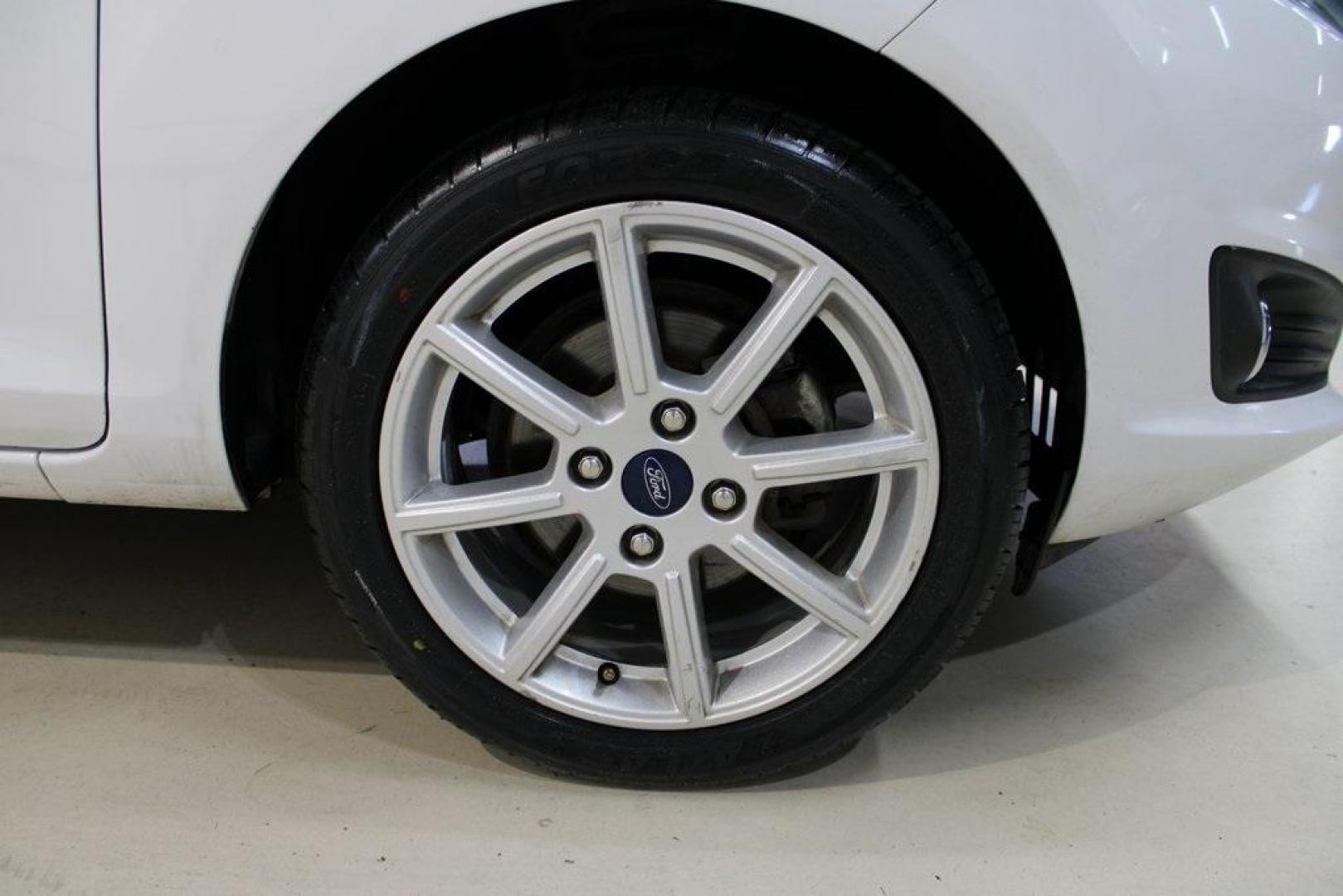2019 Oxford White /Black Ford Fiesta SE (3FADP4EJXKM) with an 1.6L I4 Ti-VCT engine, Automatic transmission, located at 15300 Midway Rd., Addison, TX, 75001, (972) 702-0011, 32.958321, -96.838074 - Photo#10
