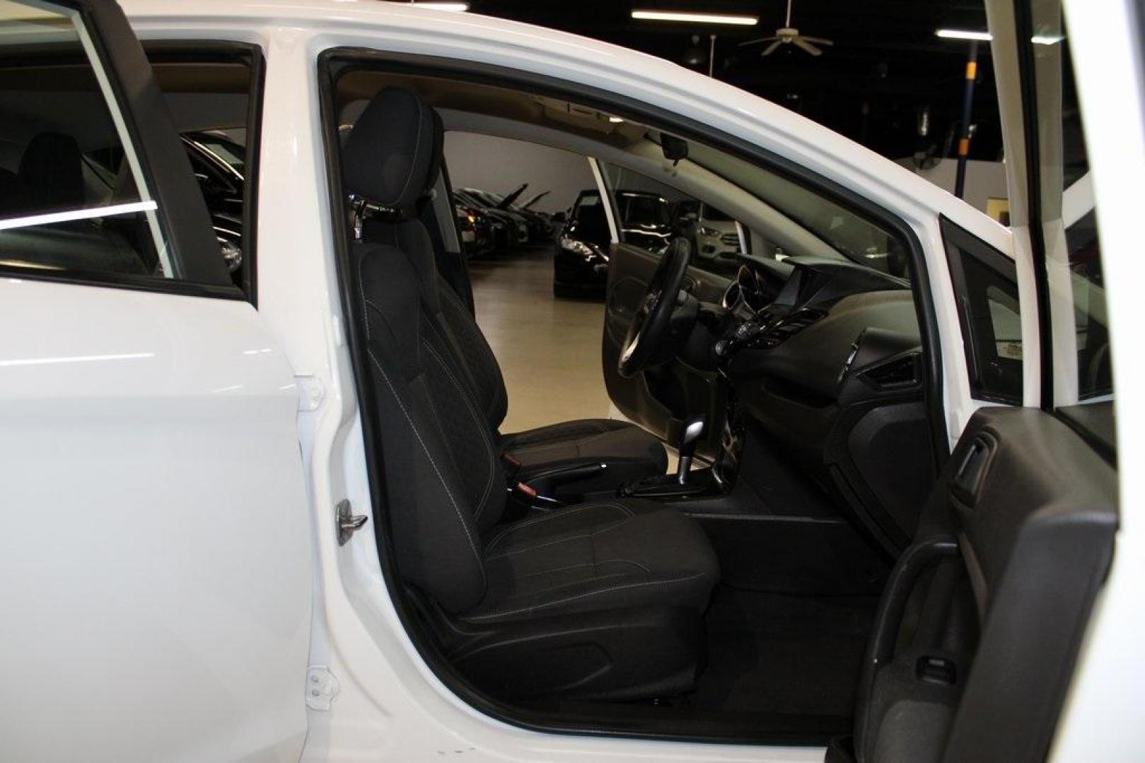 2019 Oxford White /Black Ford Fiesta SE (3FADP4EJXKM) with an 1.6L I4 Ti-VCT engine, Automatic transmission, located at 15300 Midway Rd., Addison, TX, 75001, (972) 702-0011, 32.958321, -96.838074 - Photo#12
