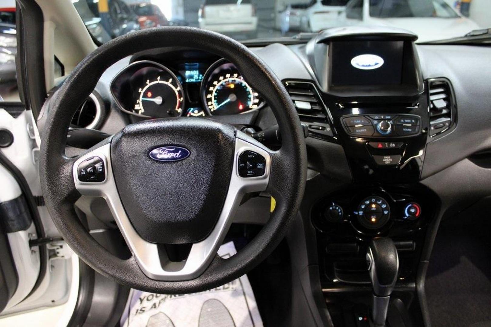 2019 Oxford White /Black Ford Fiesta SE (3FADP4EJXKM) with an 1.6L I4 Ti-VCT engine, Automatic transmission, located at 15300 Midway Rd., Addison, TX, 75001, (972) 702-0011, 32.958321, -96.838074 - Photo#15