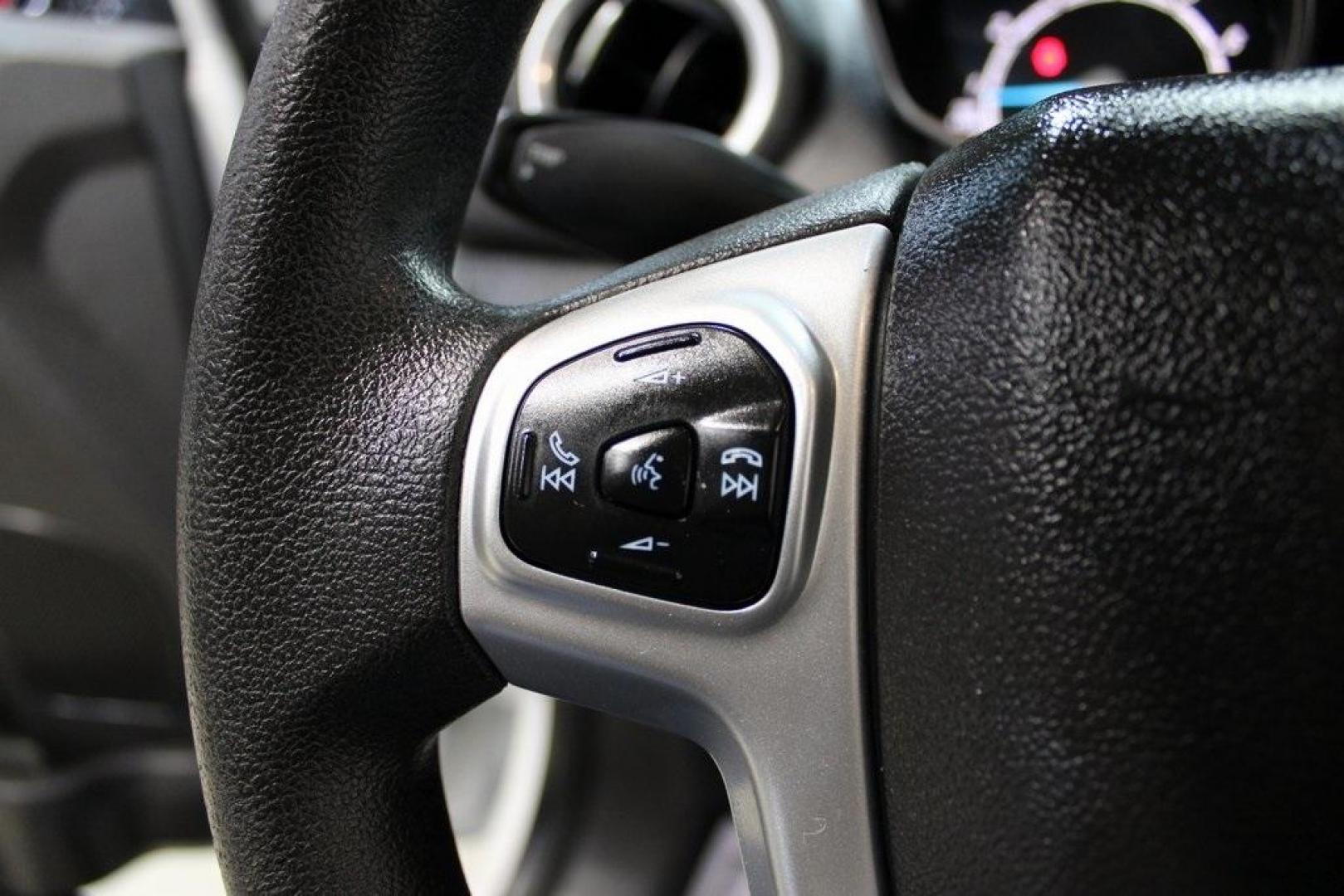 2019 Oxford White /Black Ford Fiesta SE (3FADP4EJXKM) with an 1.6L I4 Ti-VCT engine, Automatic transmission, located at 15300 Midway Rd., Addison, TX, 75001, (972) 702-0011, 32.958321, -96.838074 - Photo#22