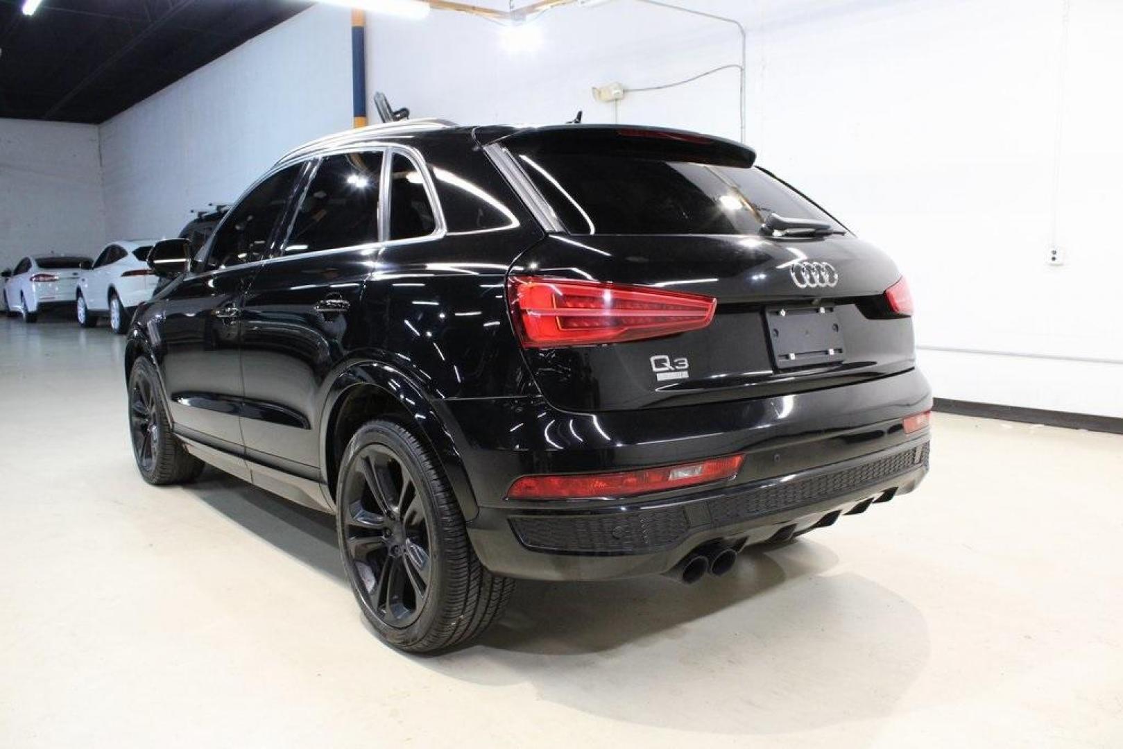 2016 Brilliant Black /Black Audi Q3 2.0T Prestige (WA1FFCFS4GR) with an 2.0L 4-Cylinder TFSI engine, Automatic transmission, located at 15300 Midway Rd., Addison, TX, 75001, (972) 702-0011, 32.958321, -96.838074 - HOME OF THE NO HAGGLE PRICE - WHOLESALE PRICES TO THE PUBLIC!!<br><br>Brilliant Black 2016 Audi Q3 2.0T Prestige<br><br>20/29 City/Highway MPG<br><br>Awards:<br> * JD Power Initial Quality Study (IQS), Vehicle Dependability Study * JD Power Initial Quality Study (IQS), Vehicle Dependability Study - Photo#3