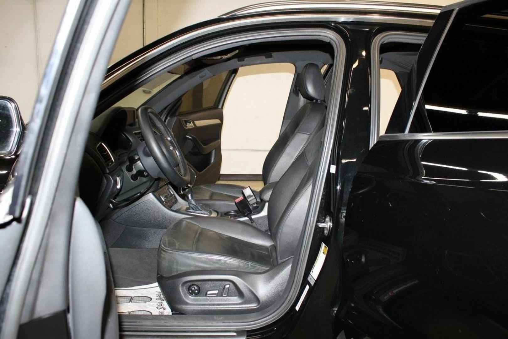 2016 Brilliant Black /Black Audi Q3 2.0T Prestige (WA1FFCFS4GR) with an 2.0L 4-Cylinder TFSI engine, Automatic transmission, located at 15300 Midway Rd., Addison, TX, 75001, (972) 702-0011, 32.958321, -96.838074 - HOME OF THE NO HAGGLE PRICE - WHOLESALE PRICES TO THE PUBLIC!!<br><br>Brilliant Black 2016 Audi Q3 2.0T Prestige<br><br>20/29 City/Highway MPG<br><br>Awards:<br> * JD Power Initial Quality Study (IQS), Vehicle Dependability Study * JD Power Initial Quality Study (IQS), Vehicle Dependability Study - Photo#13