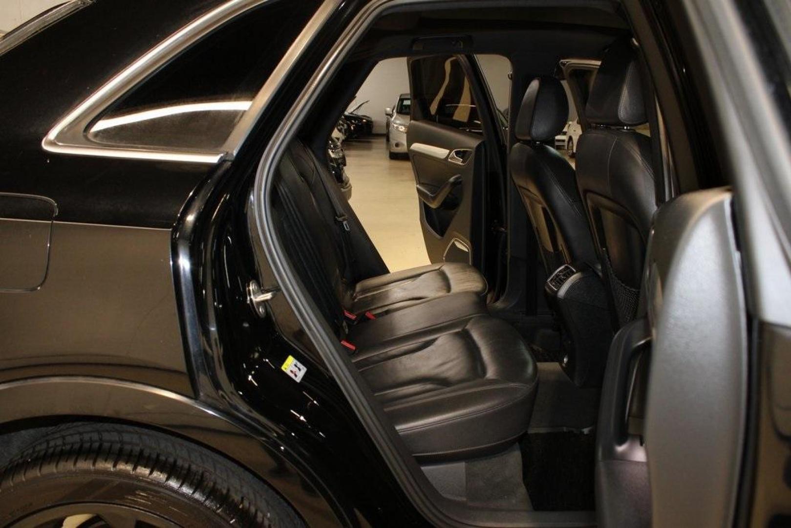 2016 Brilliant Black /Black Audi Q3 2.0T Prestige (WA1FFCFS4GR) with an 2.0L 4-Cylinder TFSI engine, Automatic transmission, located at 15300 Midway Rd., Addison, TX, 75001, (972) 702-0011, 32.958321, -96.838074 - HOME OF THE NO HAGGLE PRICE - WHOLESALE PRICES TO THE PUBLIC!!<br><br>Brilliant Black 2016 Audi Q3 2.0T Prestige<br><br>20/29 City/Highway MPG<br><br>Awards:<br> * JD Power Initial Quality Study (IQS), Vehicle Dependability Study * JD Power Initial Quality Study (IQS), Vehicle Dependability Study - Photo#15