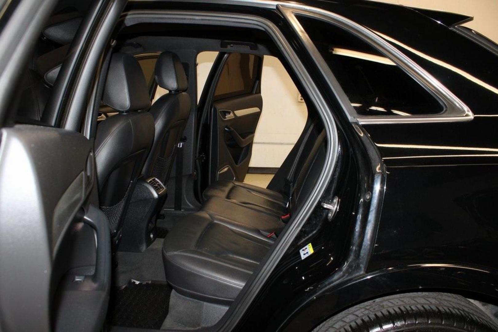 2016 Brilliant Black /Black Audi Q3 2.0T Prestige (WA1FFCFS4GR) with an 2.0L 4-Cylinder TFSI engine, Automatic transmission, located at 15300 Midway Rd., Addison, TX, 75001, (972) 702-0011, 32.958321, -96.838074 - HOME OF THE NO HAGGLE PRICE - WHOLESALE PRICES TO THE PUBLIC!!<br><br>Brilliant Black 2016 Audi Q3 2.0T Prestige<br><br>20/29 City/Highway MPG<br><br>Awards:<br> * JD Power Initial Quality Study (IQS), Vehicle Dependability Study * JD Power Initial Quality Study (IQS), Vehicle Dependability Study - Photo#16